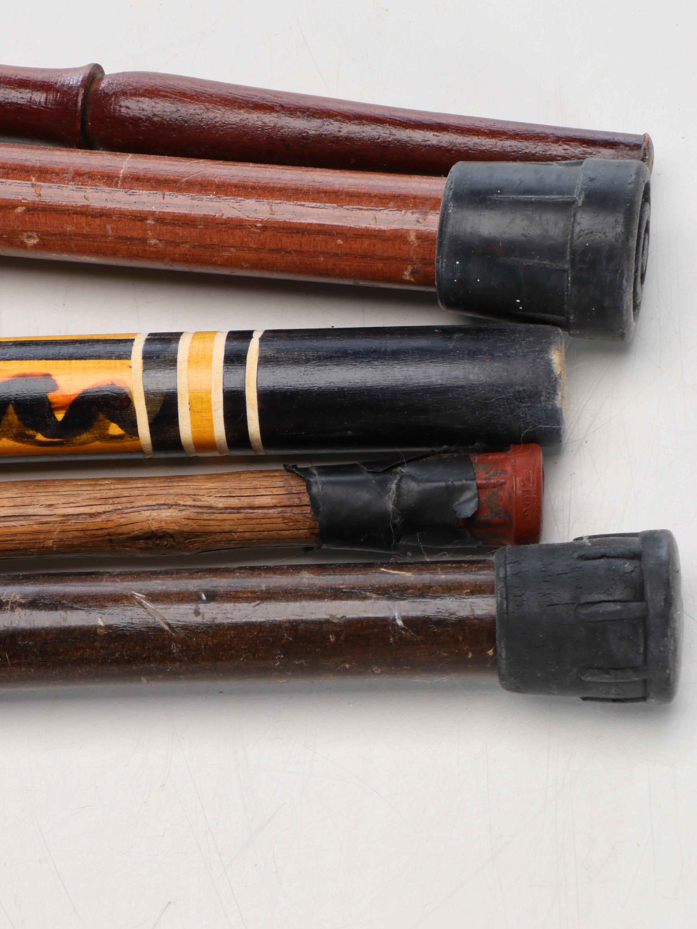 Woven Umbrella Basket with Carved and Painted Wooden Canes