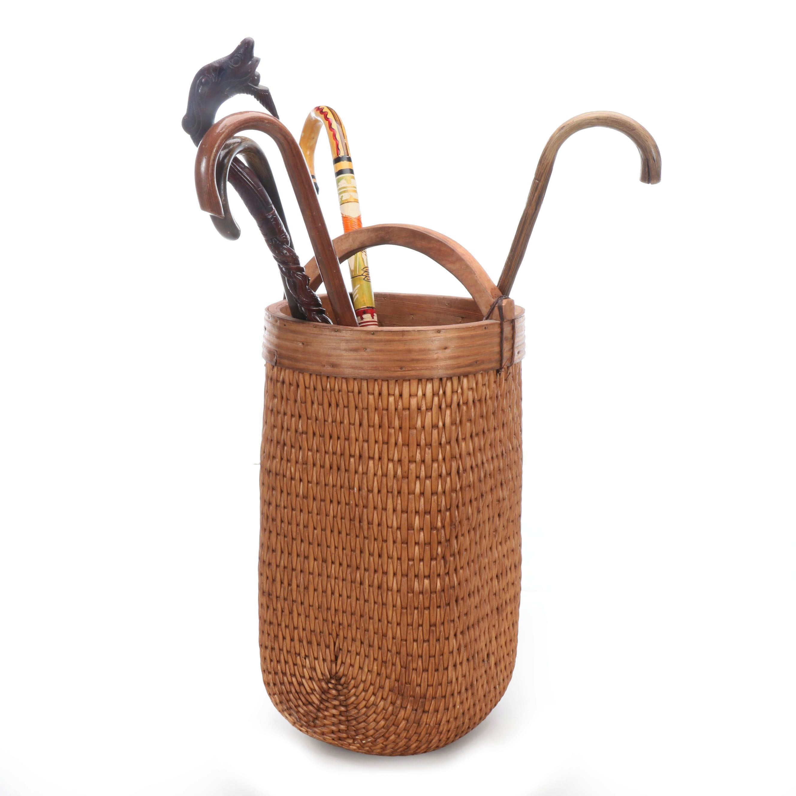 Woven Umbrella Basket with Carved and Painted Wooden Canes