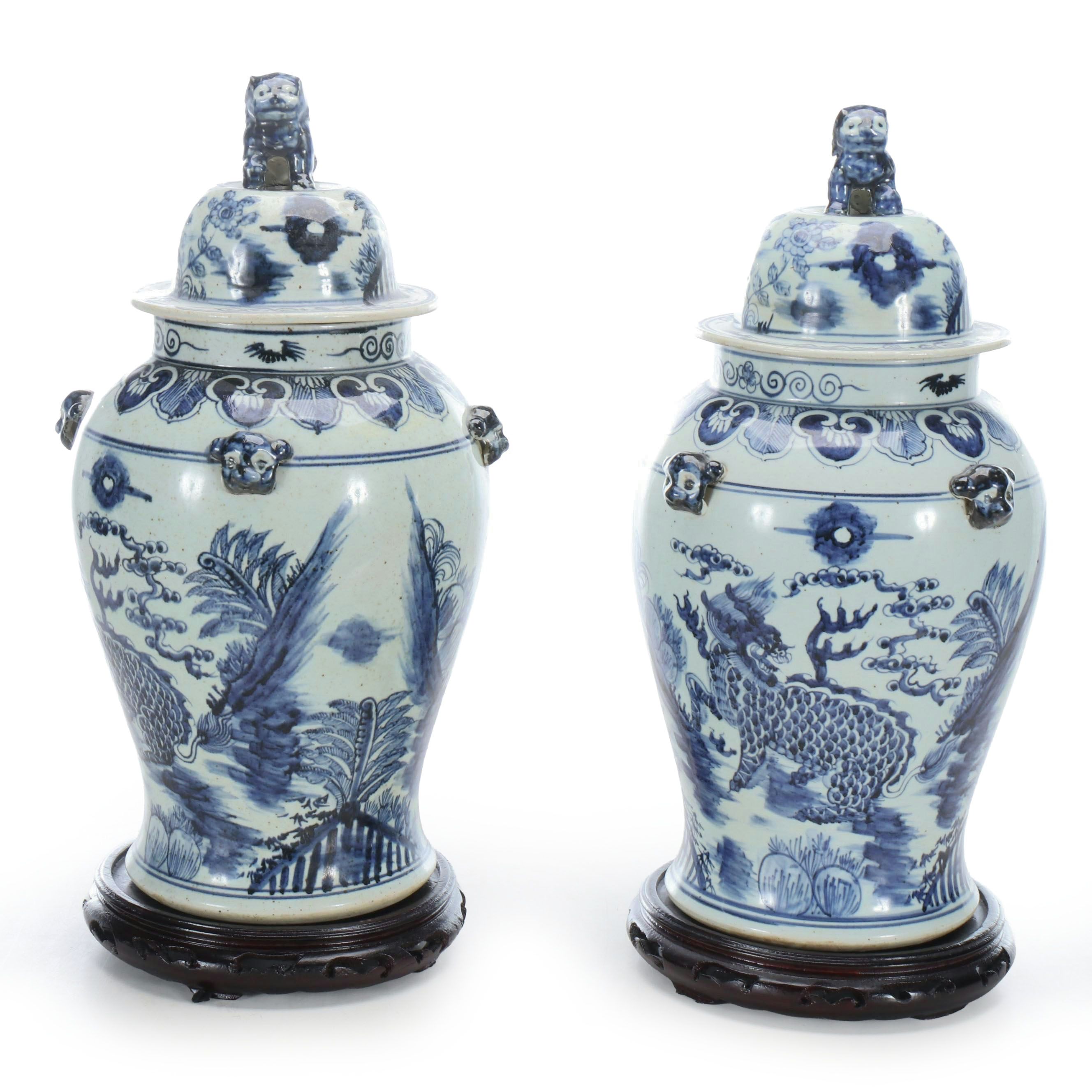 Pair of Chinese Blue and White Porcelain Temple Jars with Carved Wood Stands
