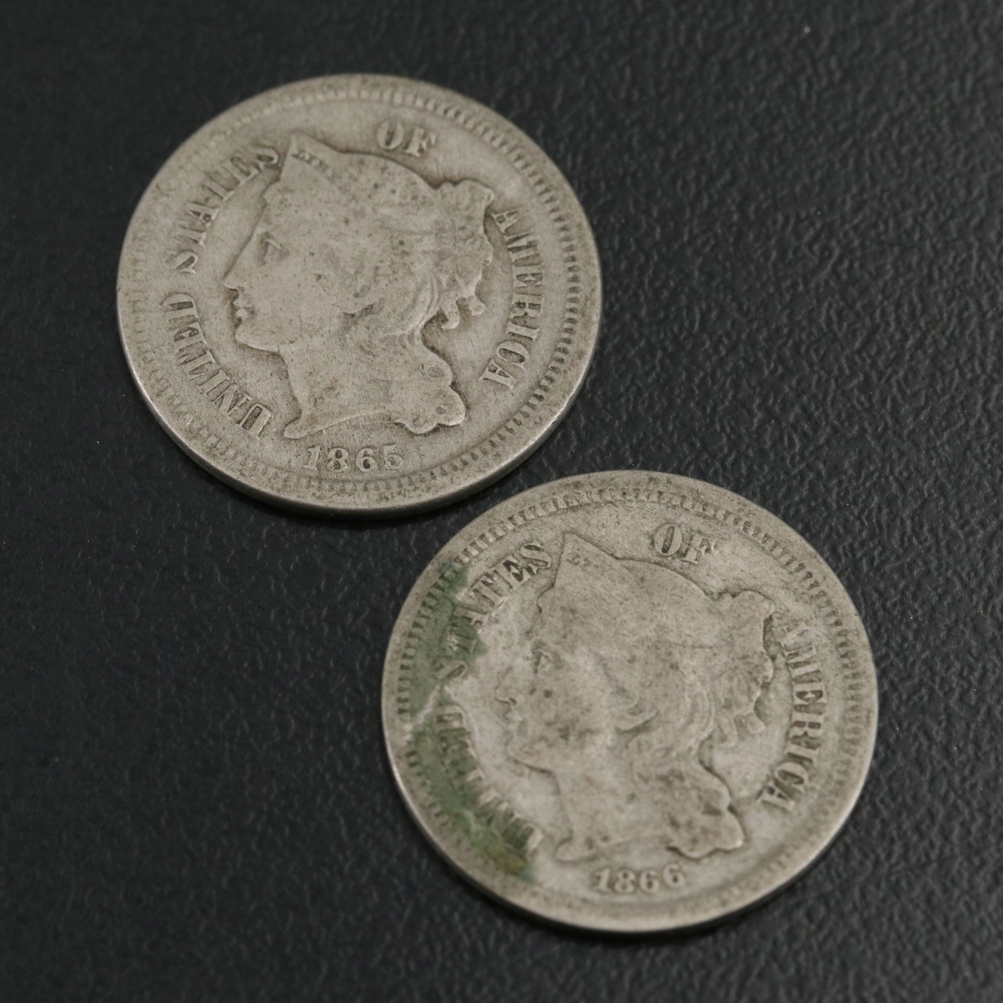 7 different U.S. three cent nickels 1865, 1866, 1867, 1868, 1869, 1870, and 1974