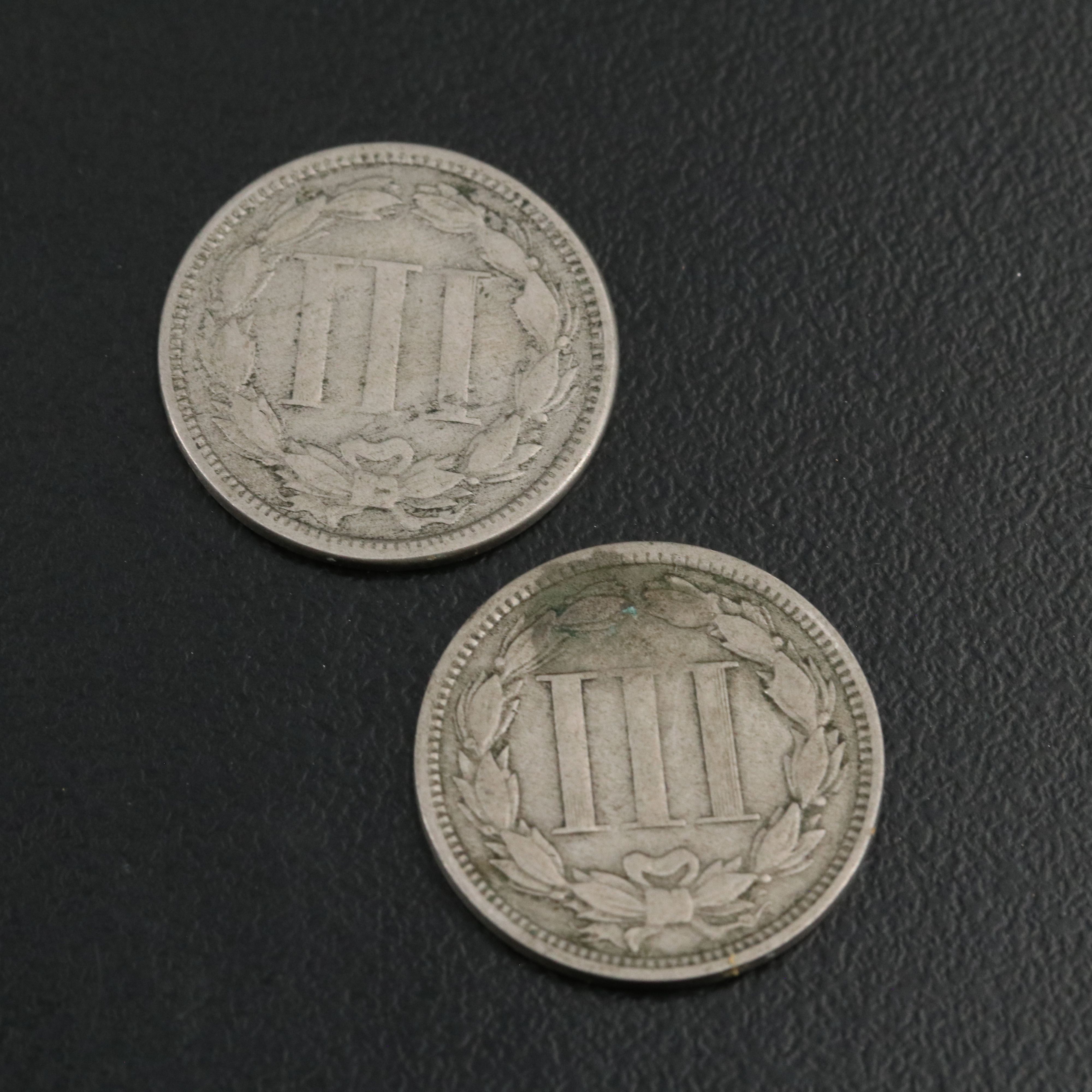 7 different U.S. three cent nickels 1865, 1866, 1867, 1868, 1869, 1870, and 1974