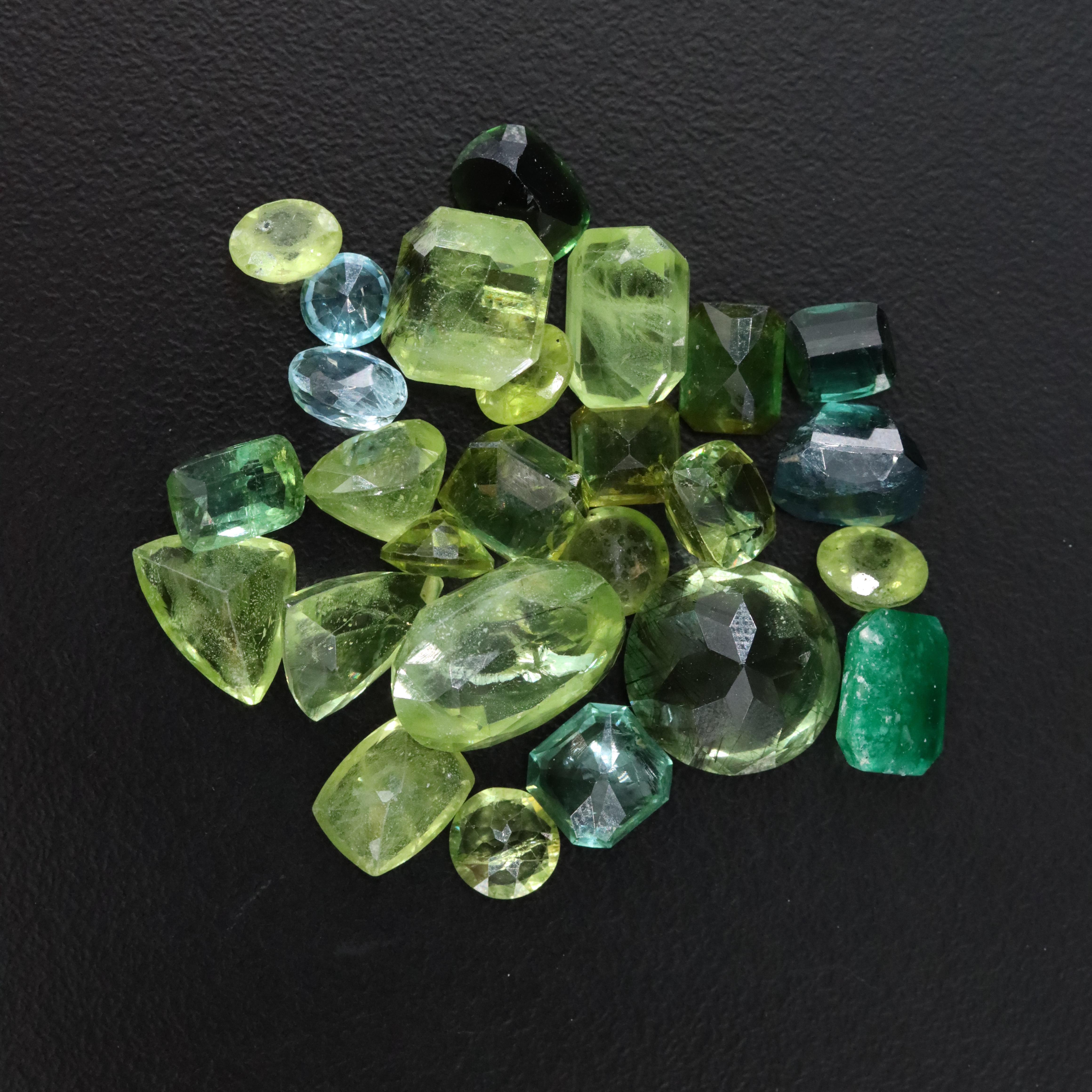Loose 57.75 CTW Assorted Gemstones with Peridot, Tourmaline and Blue Topaz