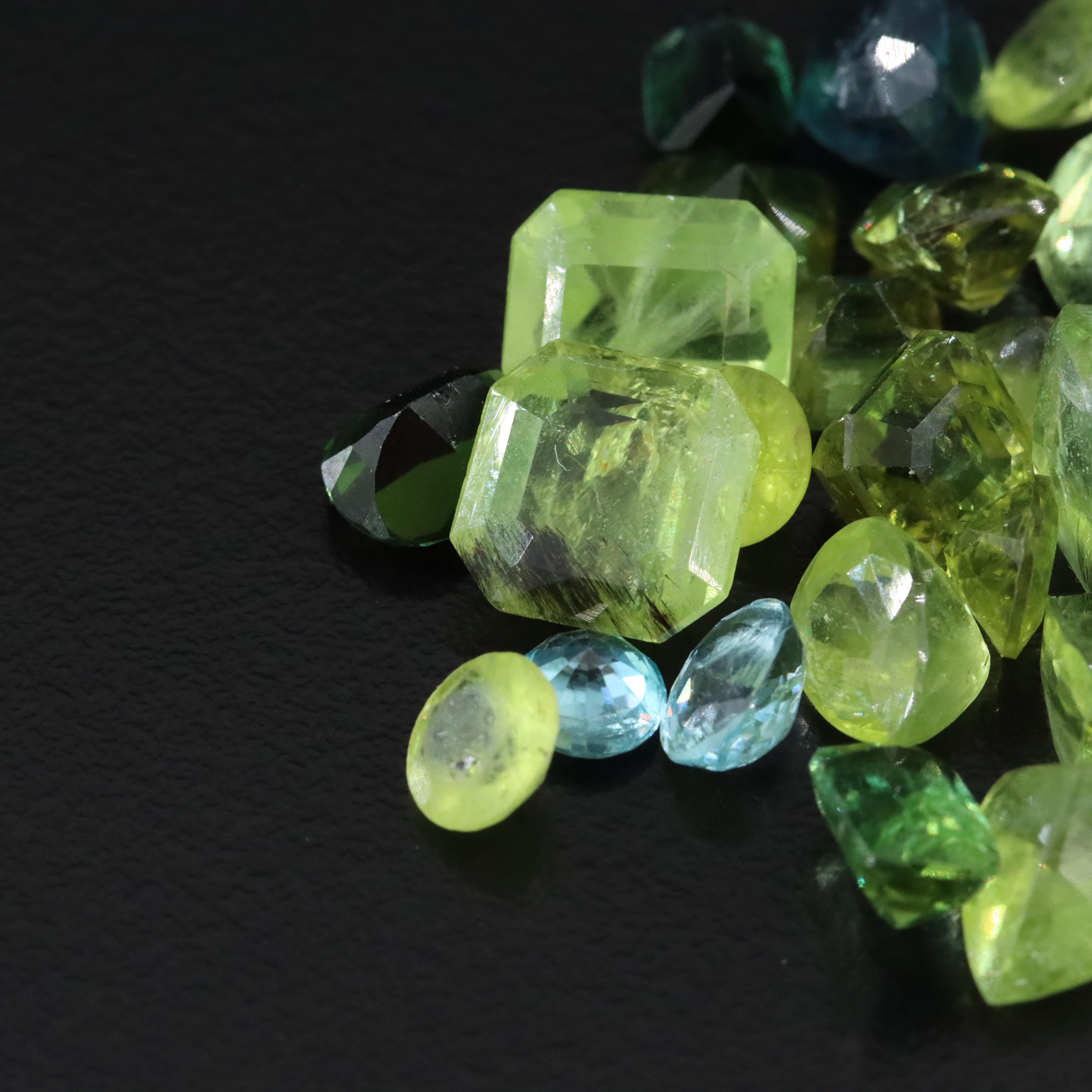 Loose 57.75 CTW Assorted Gemstones with Peridot, Tourmaline and Blue Topaz