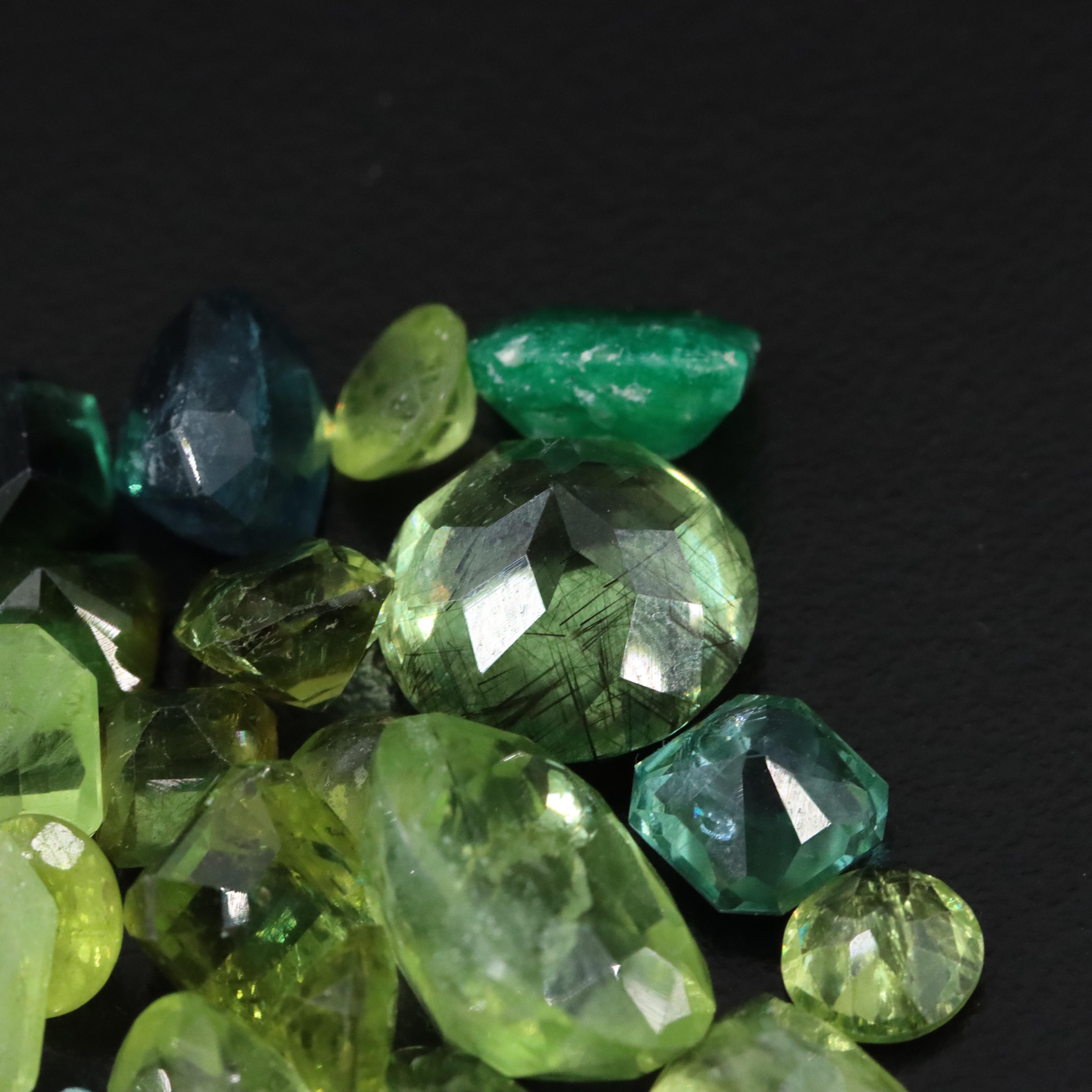 Loose 57.75 CTW Assorted Gemstones with Peridot, Tourmaline and Blue Topaz