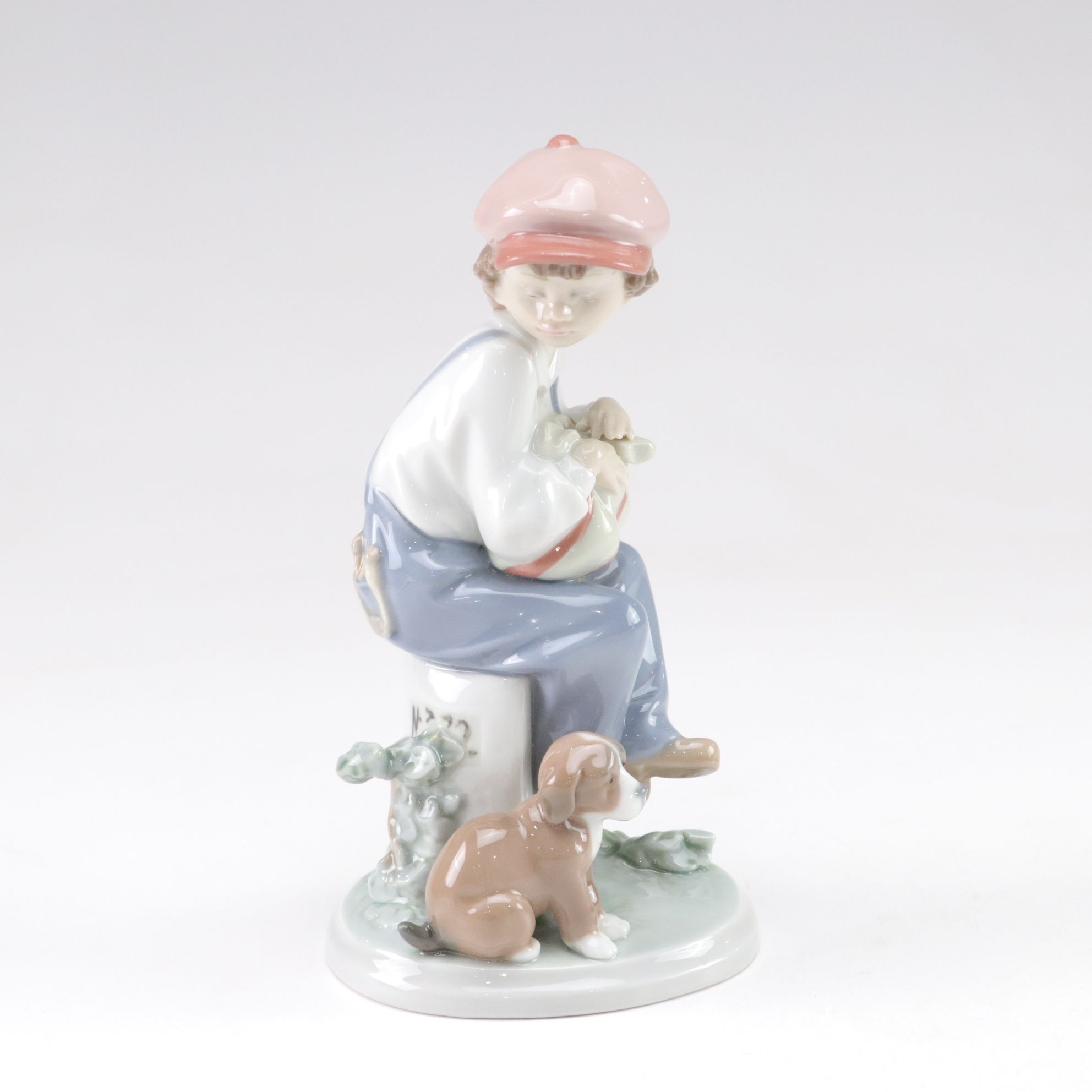 Lladró "My Best Friend" and Nao "Listening to the Birds" Porcelain Figurines