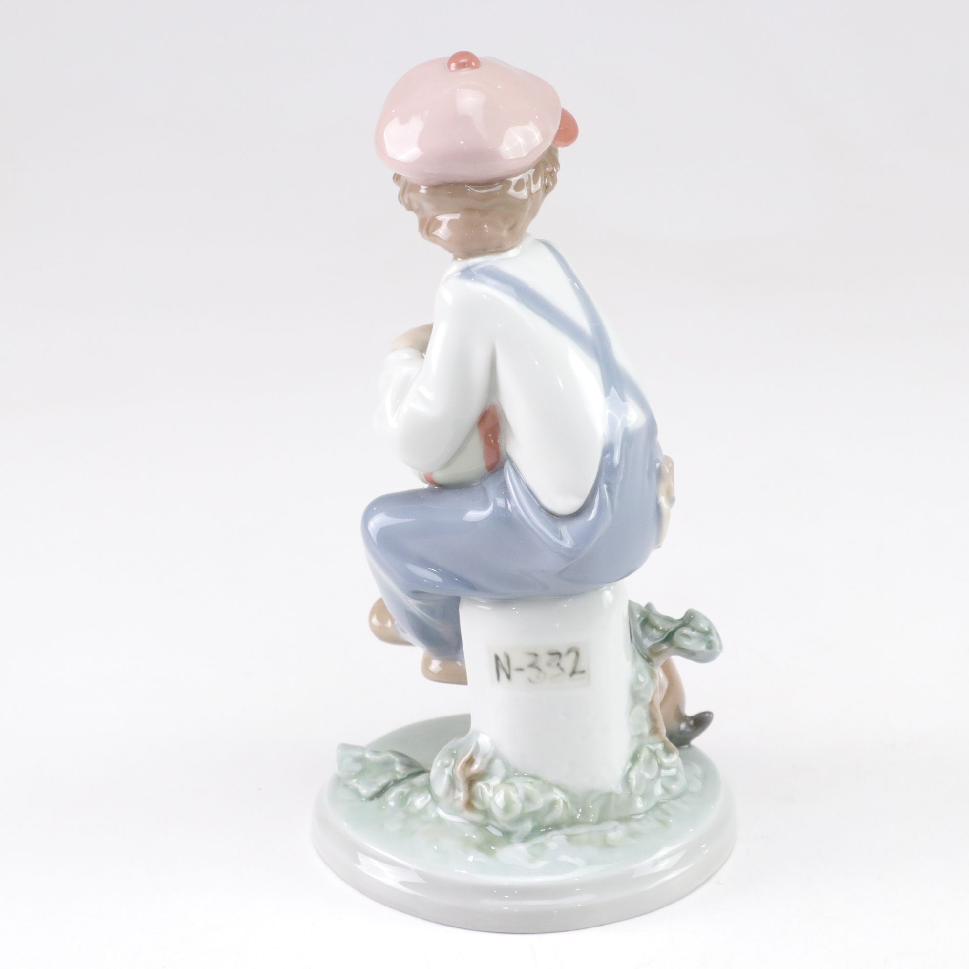 Lladró "My Best Friend" and Nao "Listening to the Birds" Porcelain Figurines