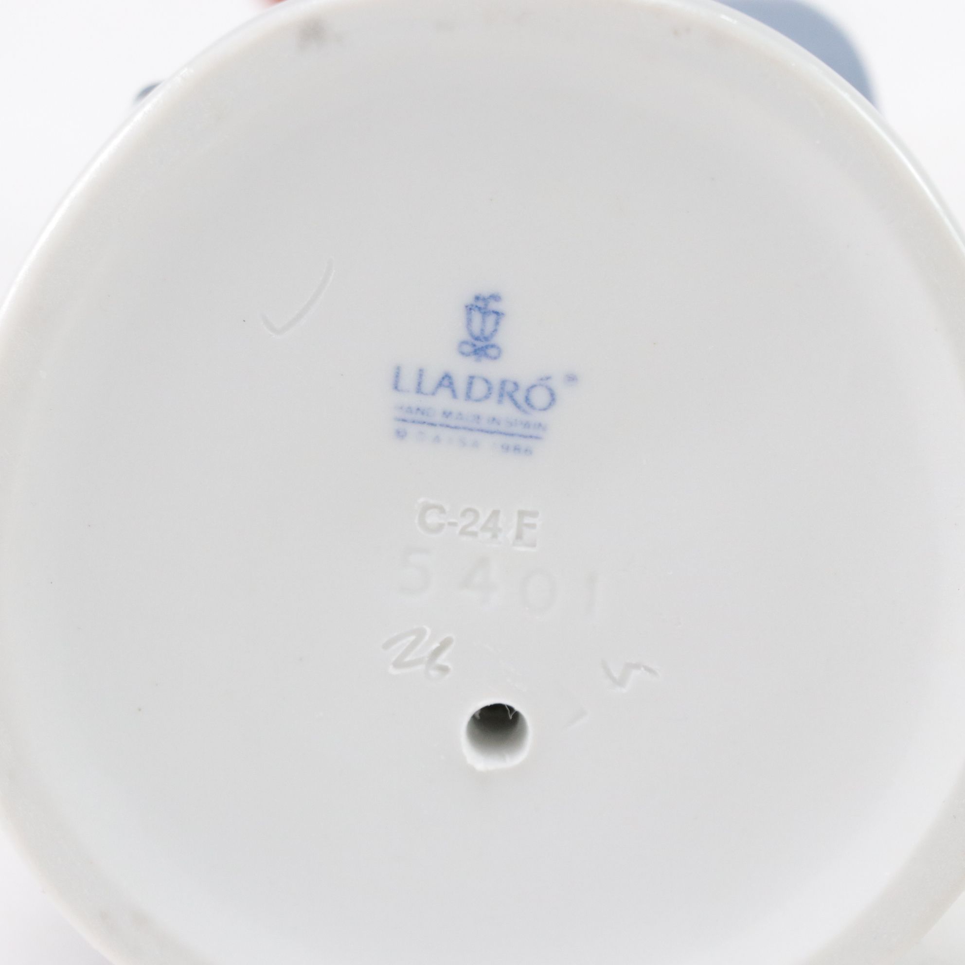 Lladró "My Best Friend" and Nao "Listening to the Birds" Porcelain Figurines