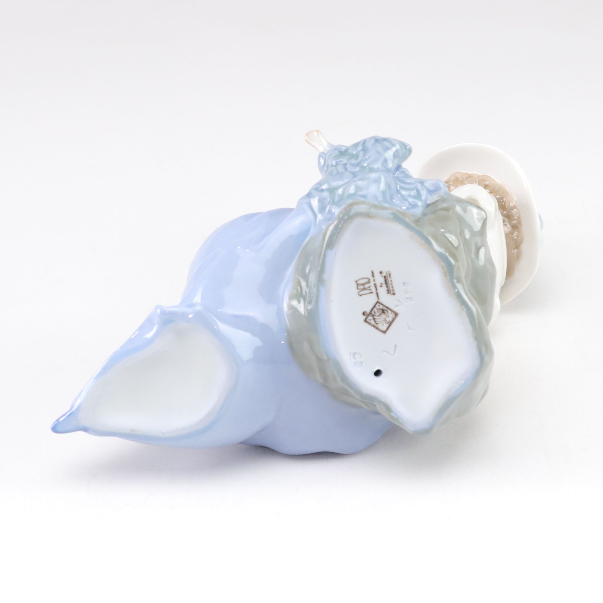 Lladró "My Best Friend" and Nao "Listening to the Birds" Porcelain Figurines