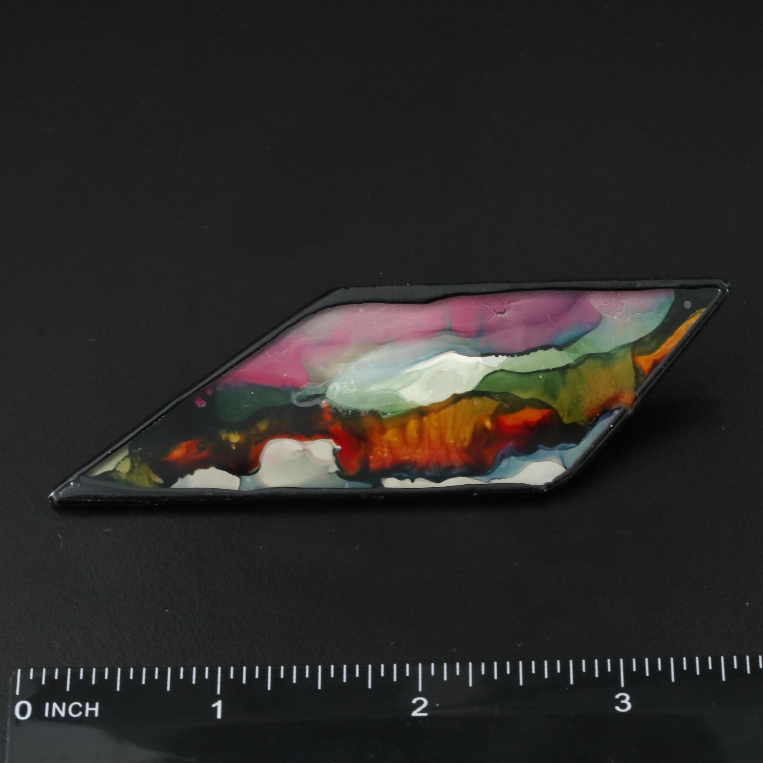 Pair of Glass Brooches