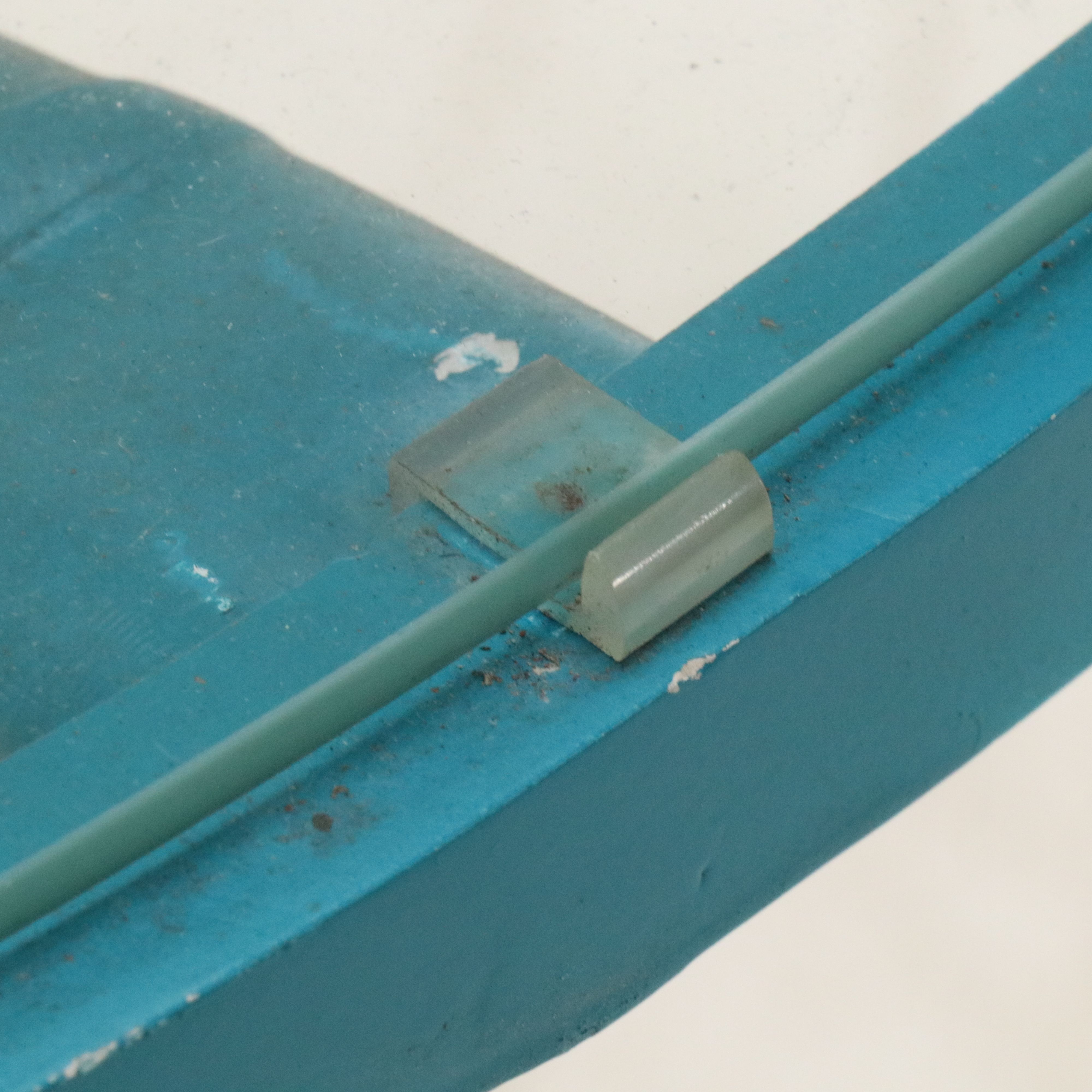 Glass Top Blue-Painted Metal Patio Dining Table with Bamboo Motif Legs