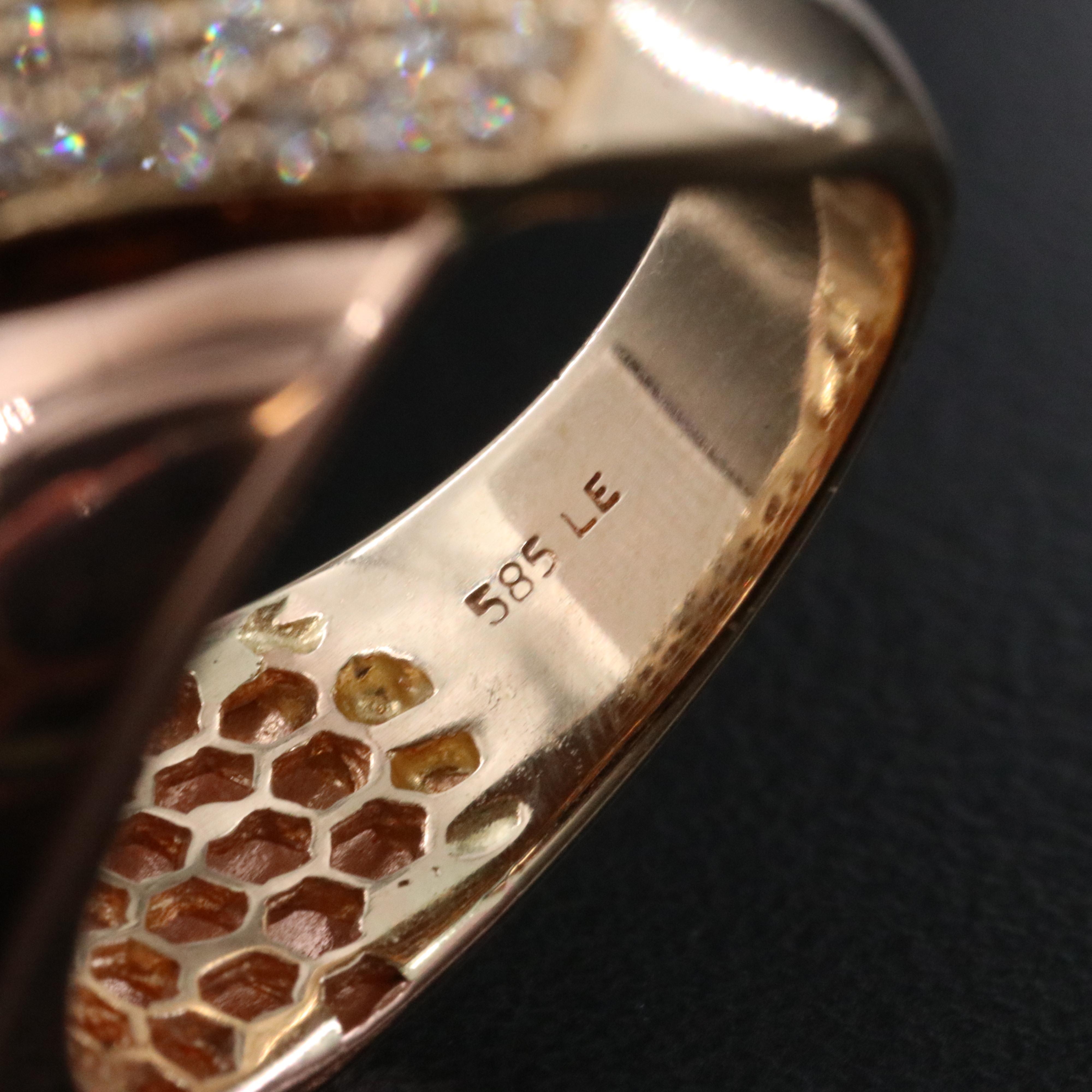 14K 0.59 CTW Diamond Ring with Rose Gold Bypass