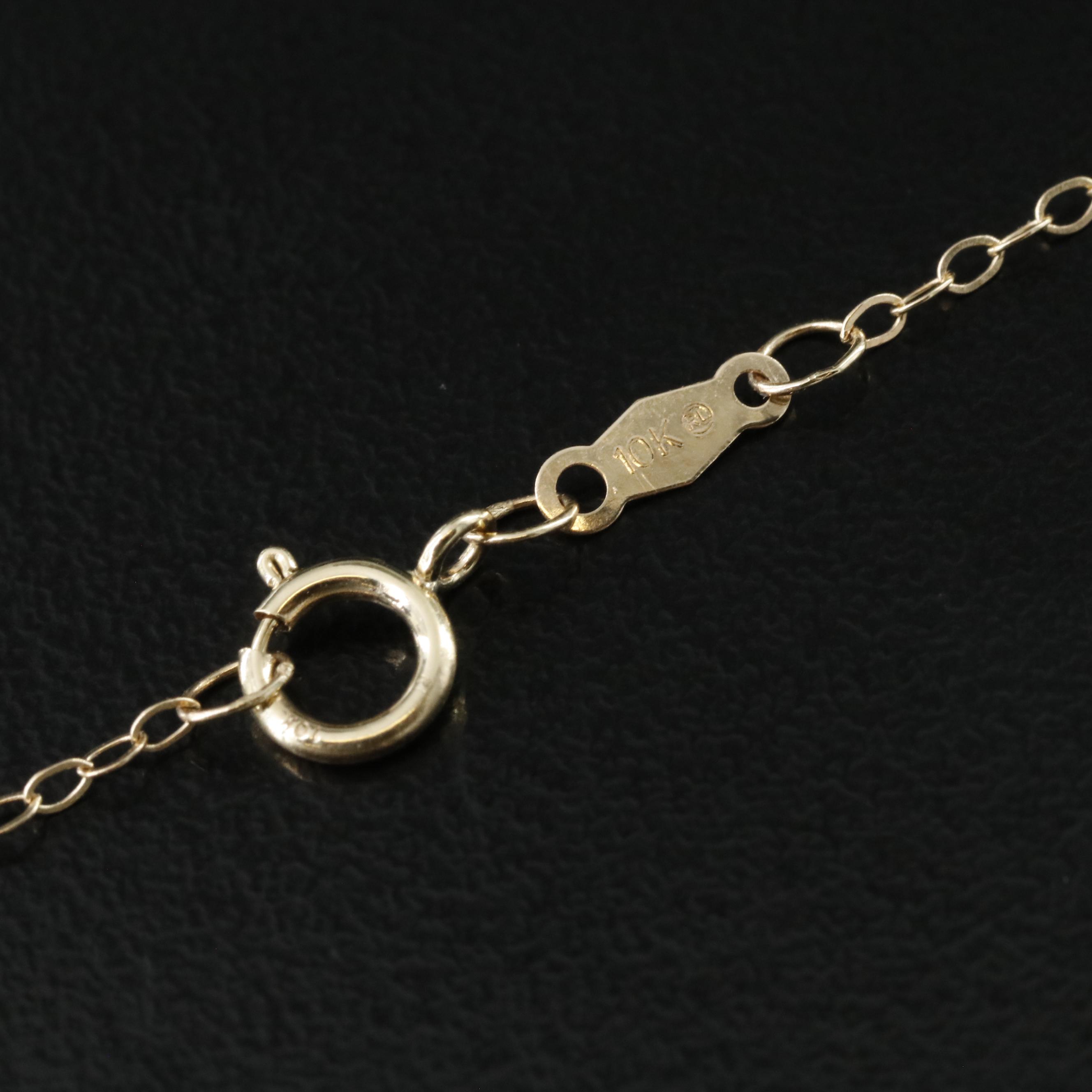 10K Tiered Cross Necklace