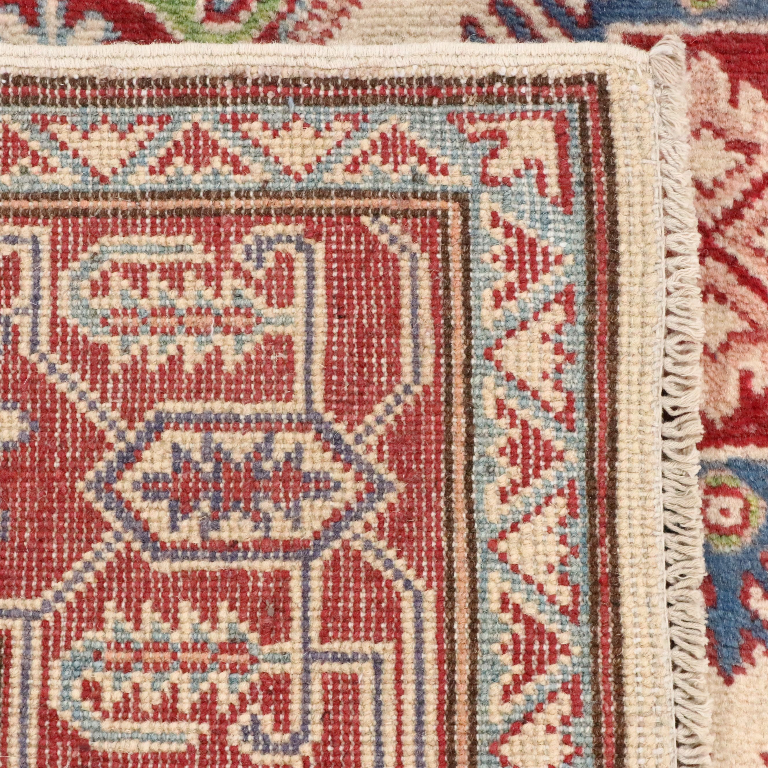4'11 x 6'9 Hand-Knotted Pakistani Kazak Area Rug