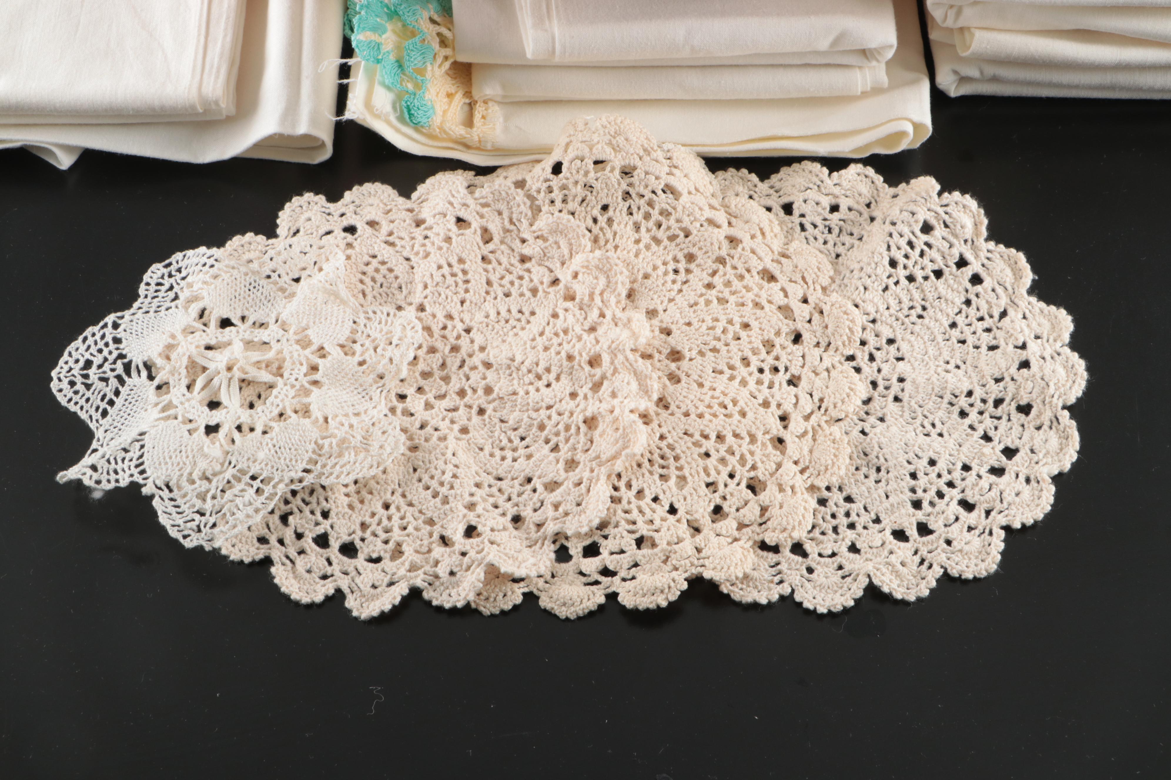 Vintage Pillowcases and Doilies with Handmade Crochet Dress Doll