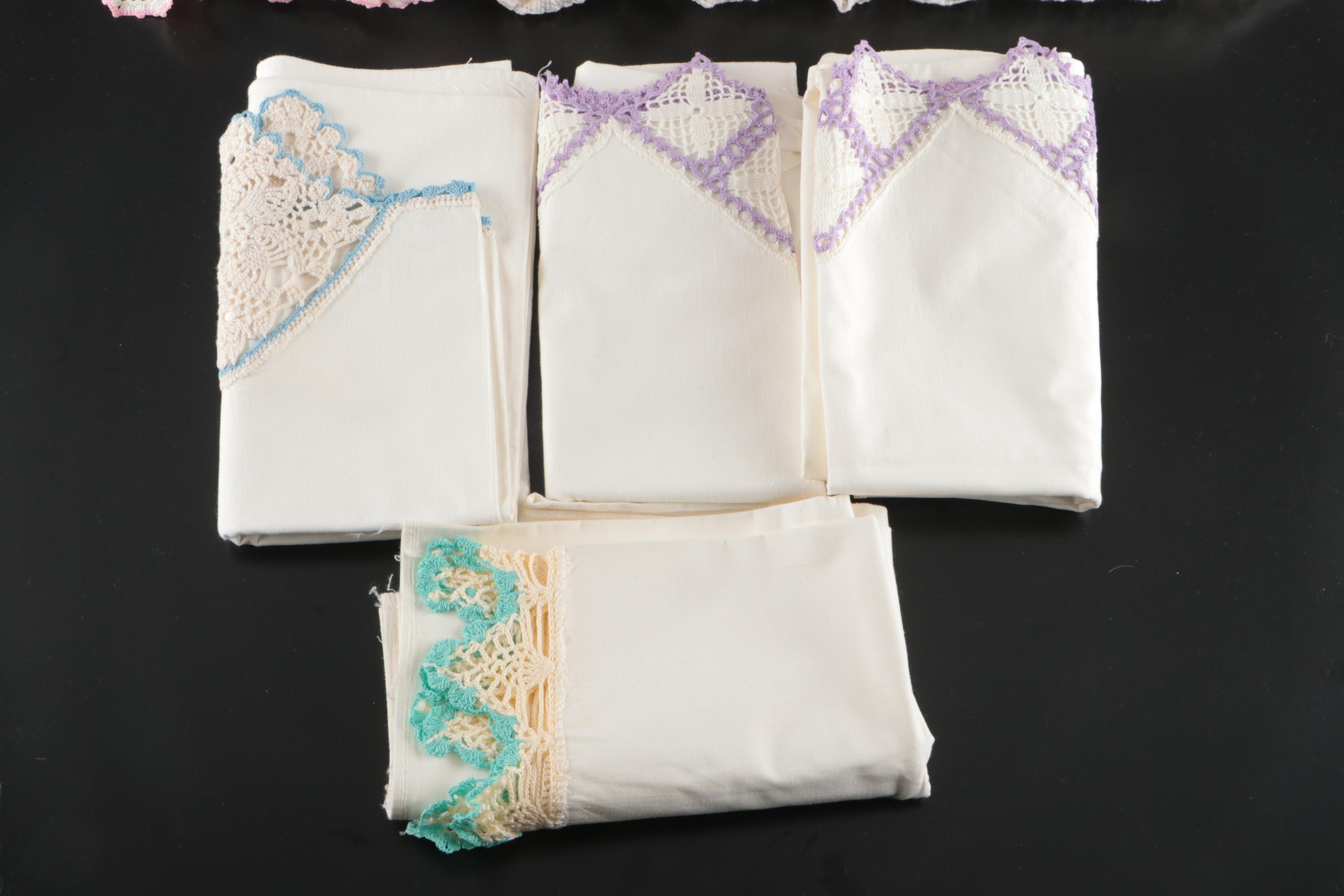 Vintage Pillowcases and Doilies with Handmade Crochet Dress Doll