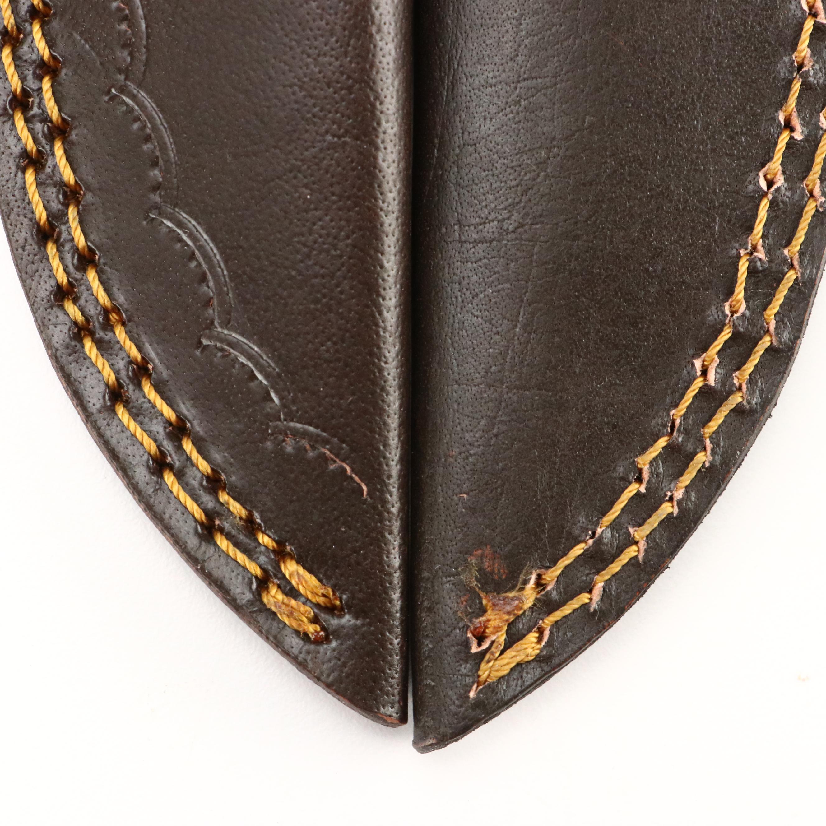 Damascus Steel and Wooden Handled Hunting Knives in Leather Scabbards