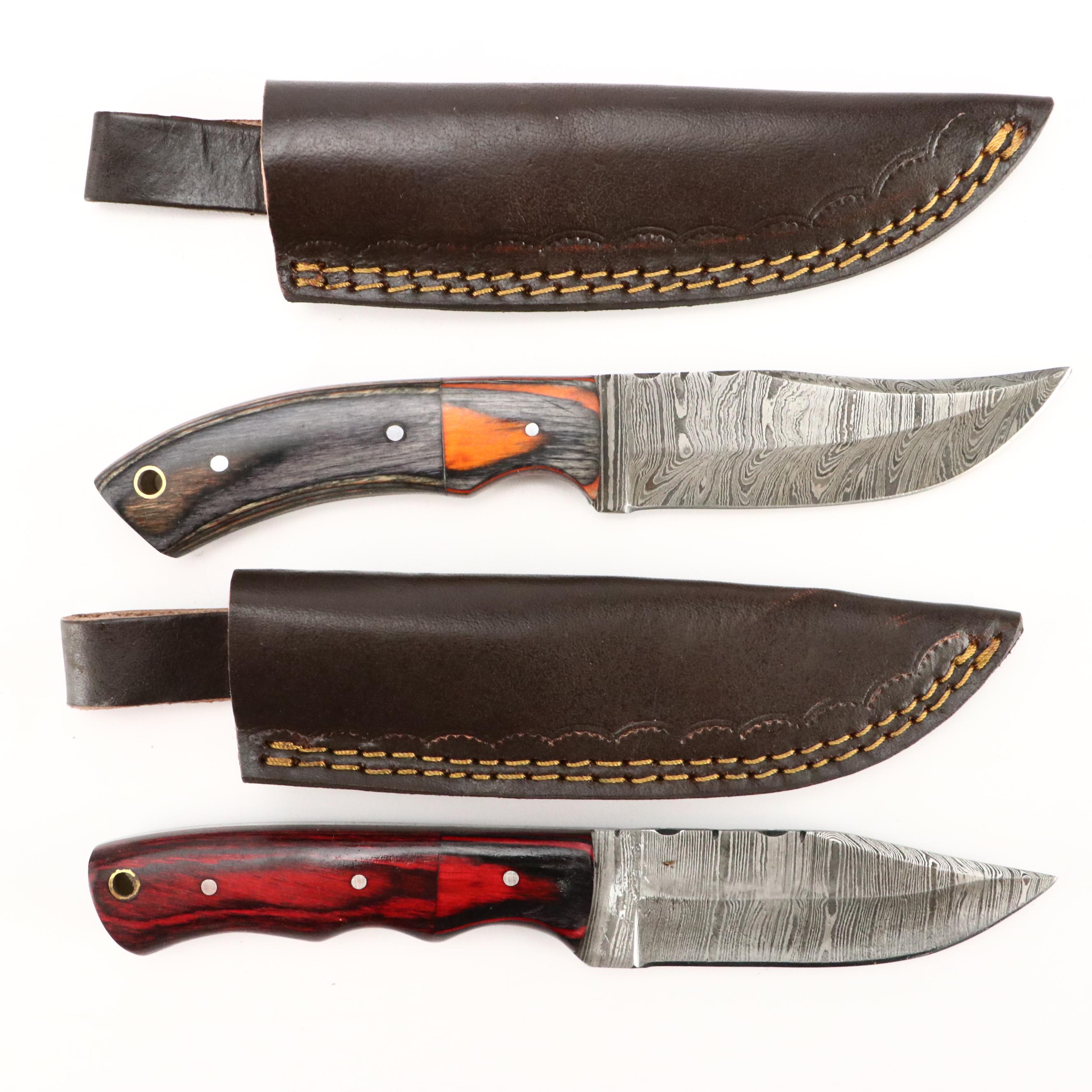 Damascus Steel and Wooden Handled Hunting Knives in Leather Scabbards