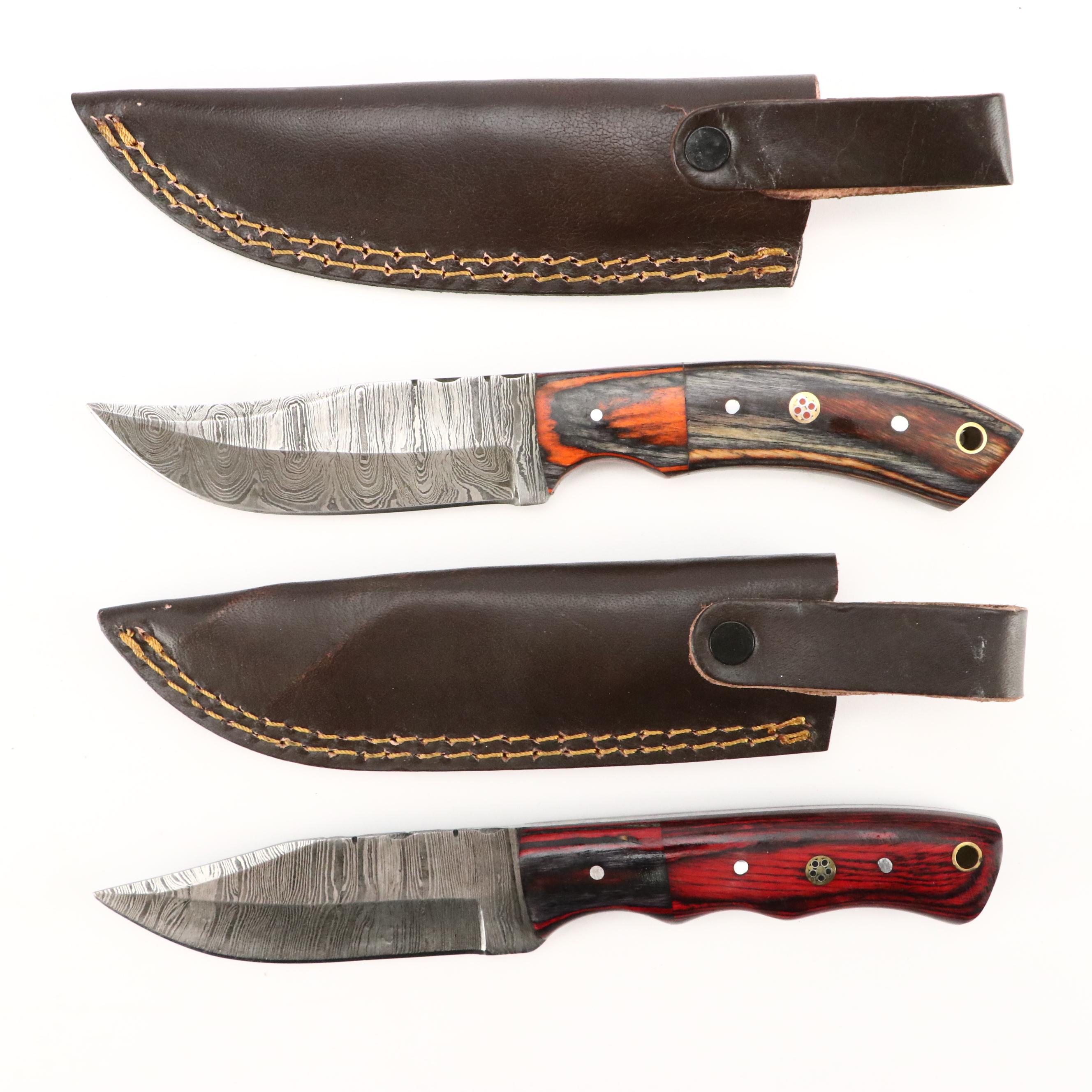 Damascus Steel and Wooden Handled Hunting Knives in Leather Scabbards