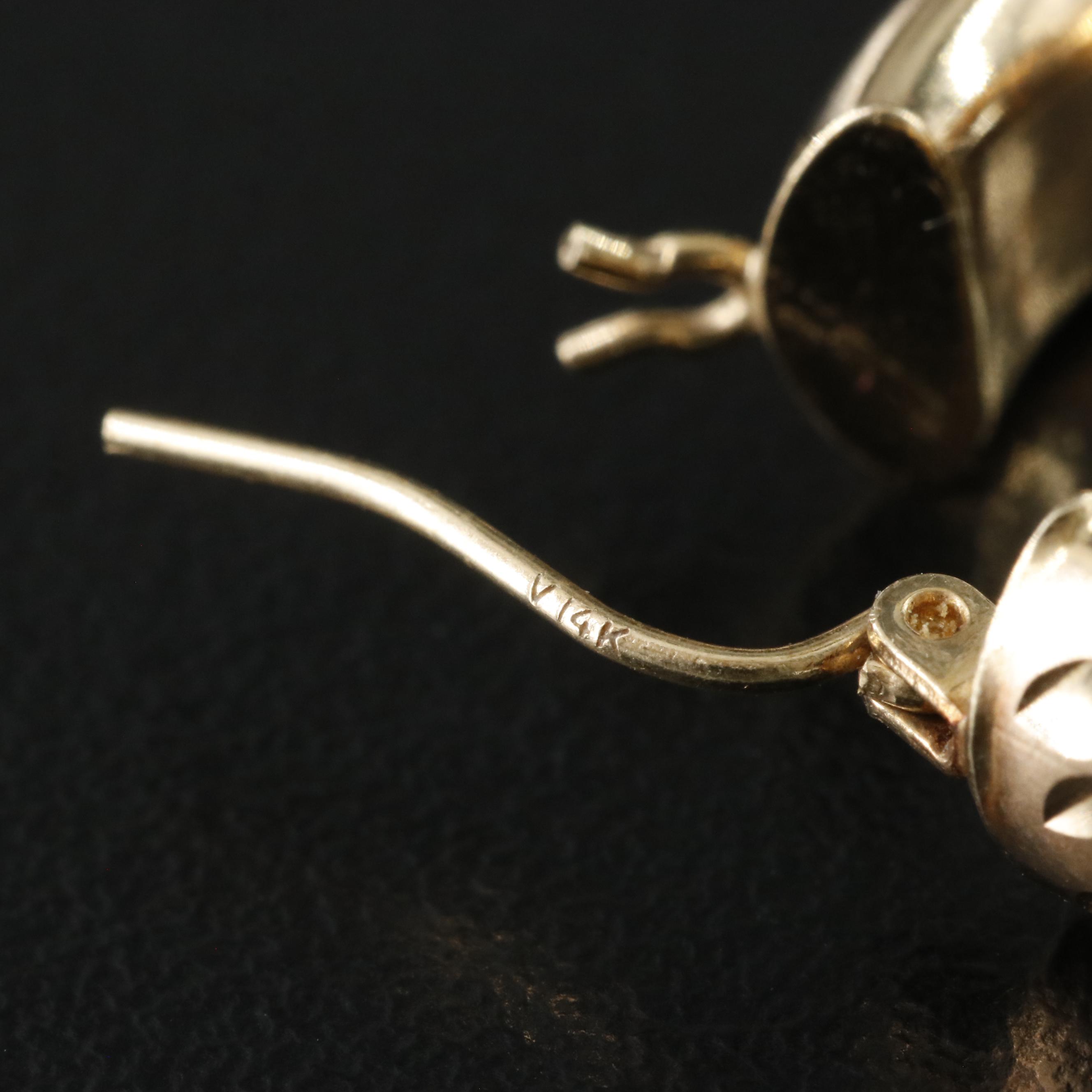 14K Diamond-Cut Style Oval Hoops