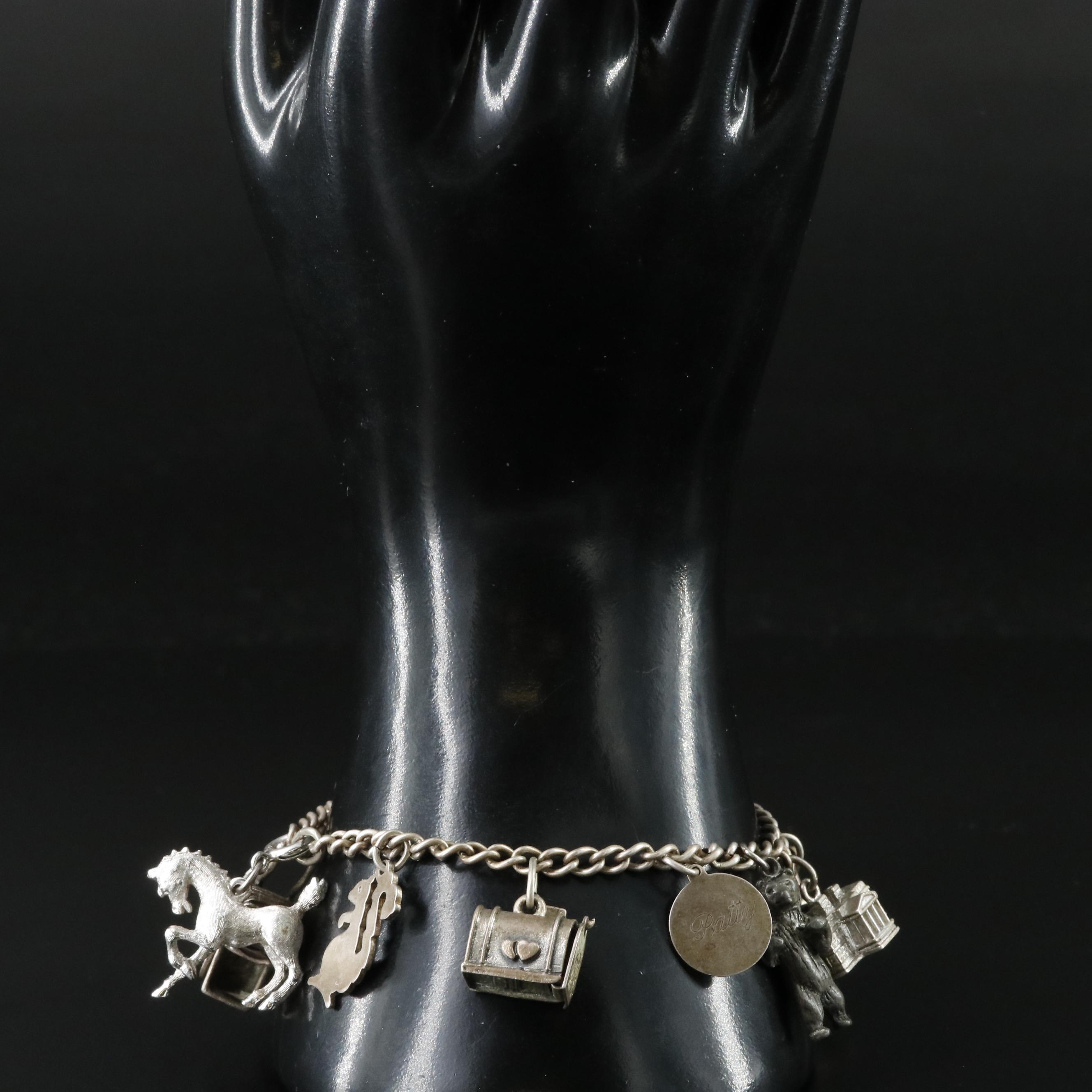 Vintage Sterling Charm Bracelet Including Articulated