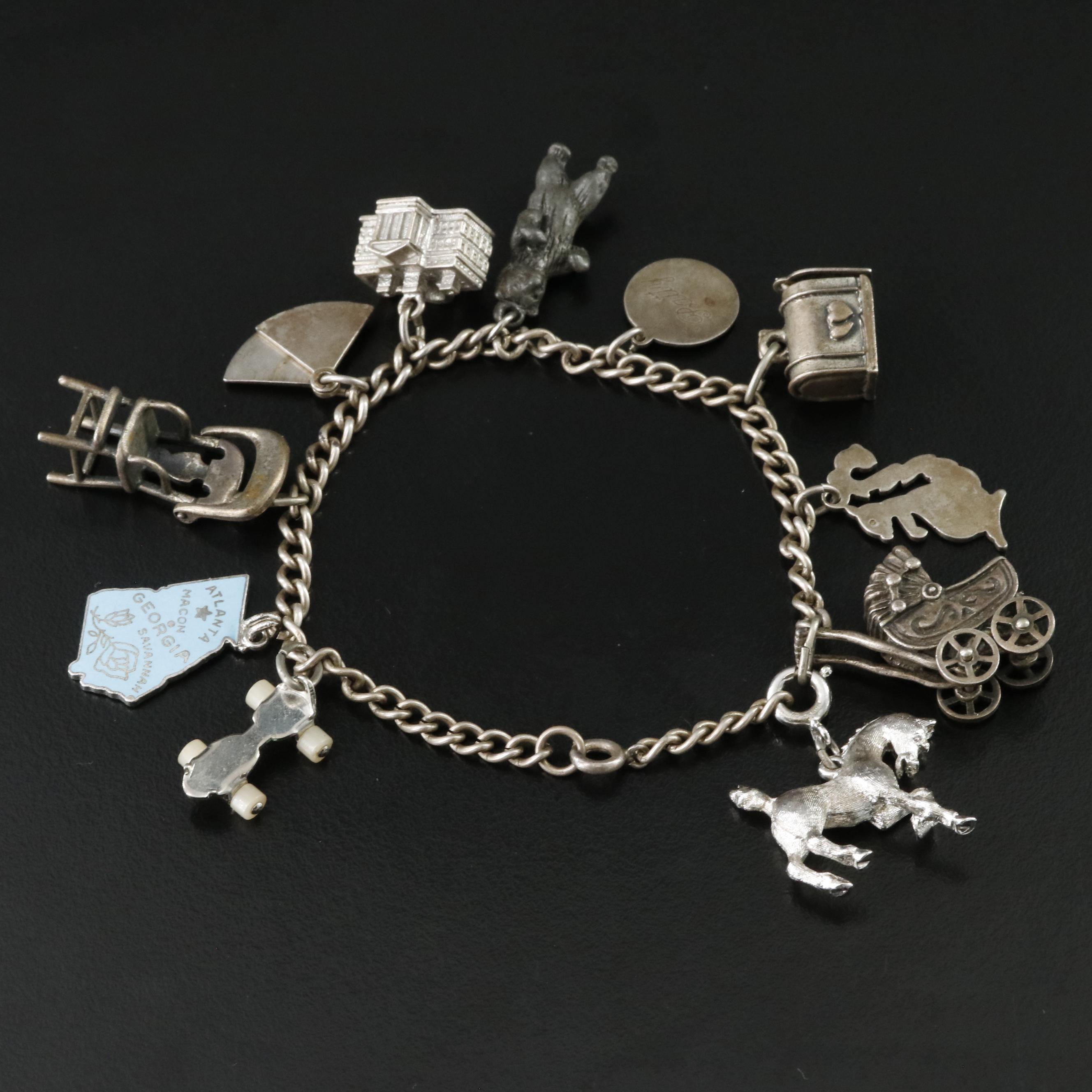 Vintage Sterling Charm Bracelet Including Articulated