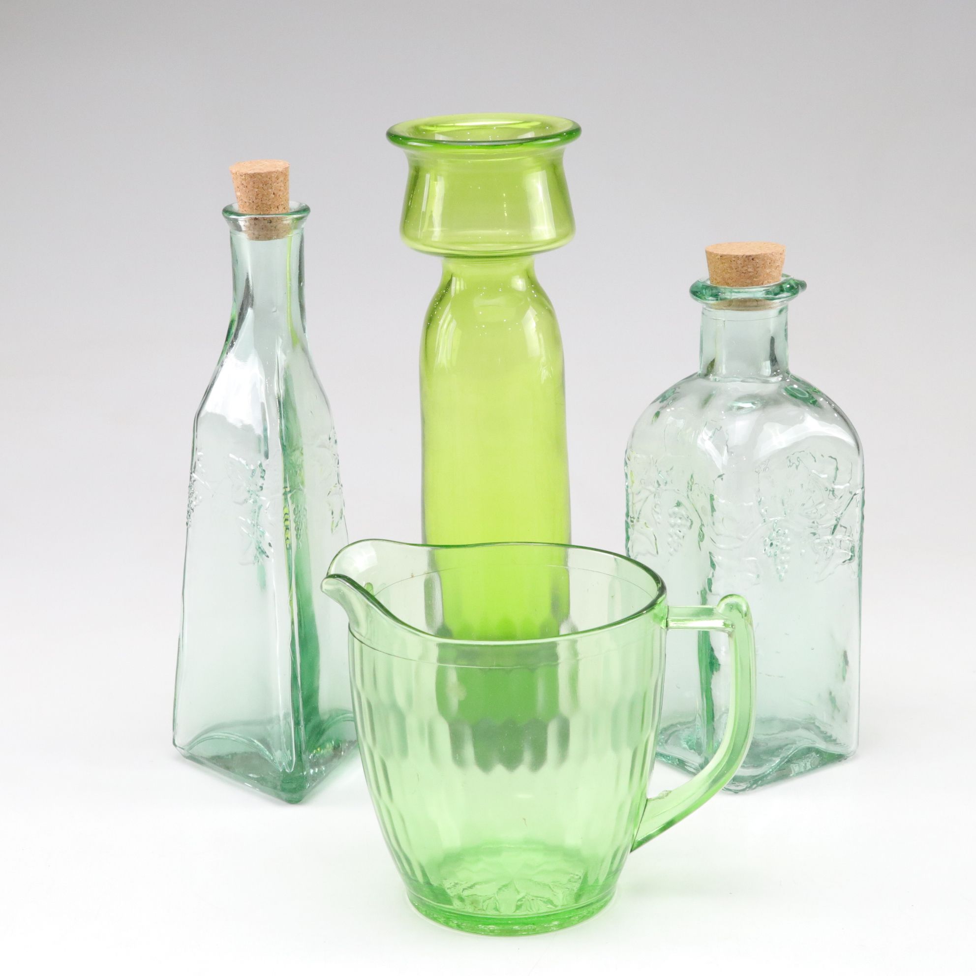 Uranium Glass Pitcher with Pfaltzgraff "Valencia" Bottles and Green Carafe