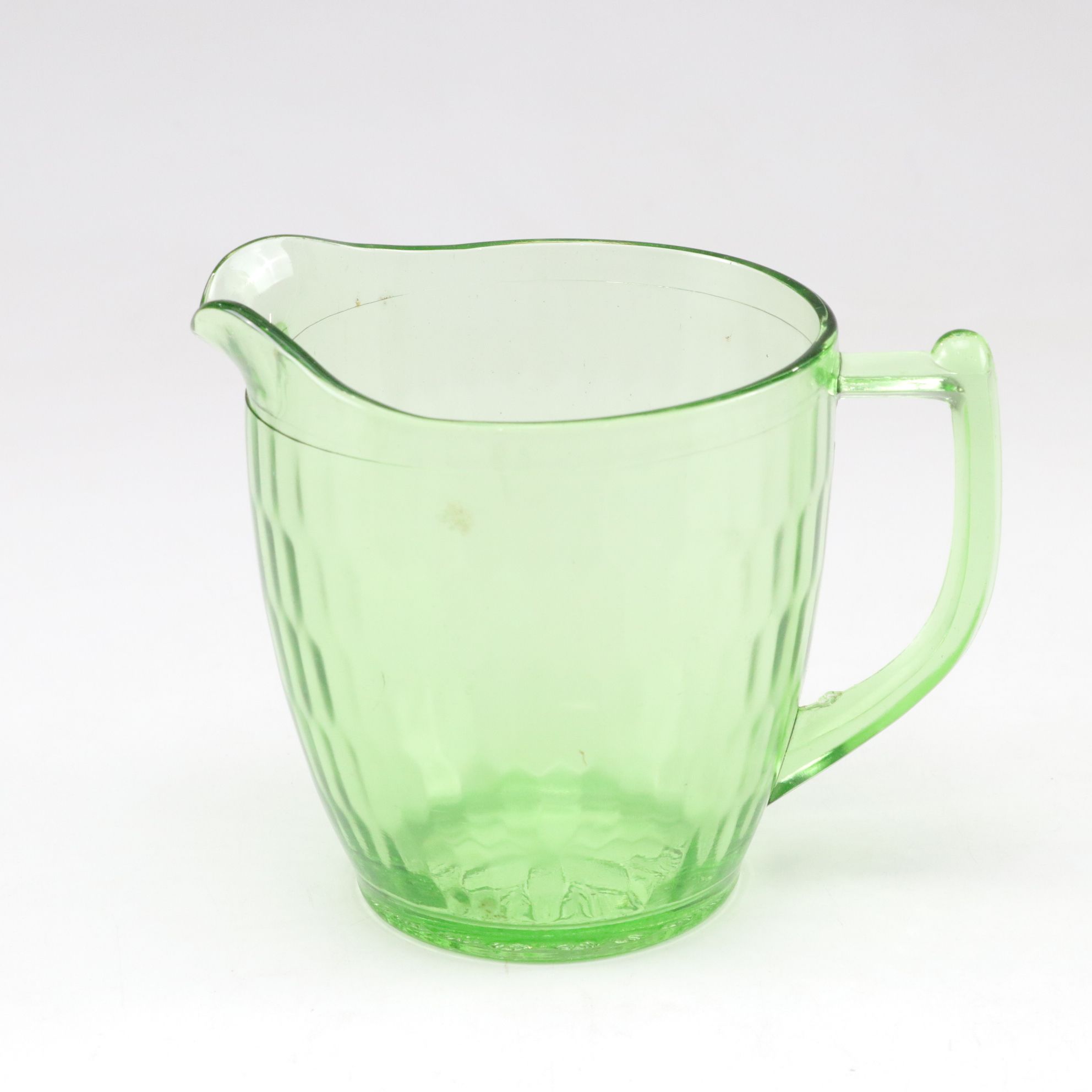 Uranium Glass Pitcher with Pfaltzgraff "Valencia" Bottles and Green Carafe