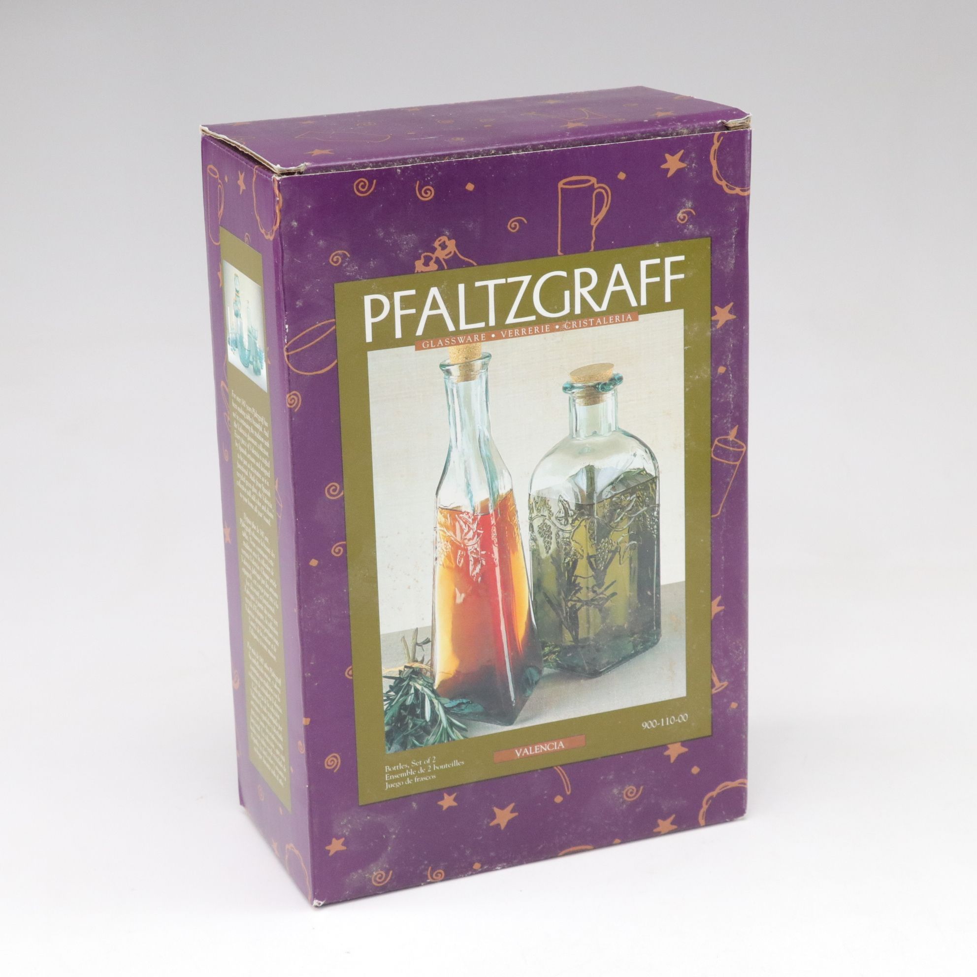 Uranium Glass Pitcher with Pfaltzgraff "Valencia" Bottles and Green Carafe