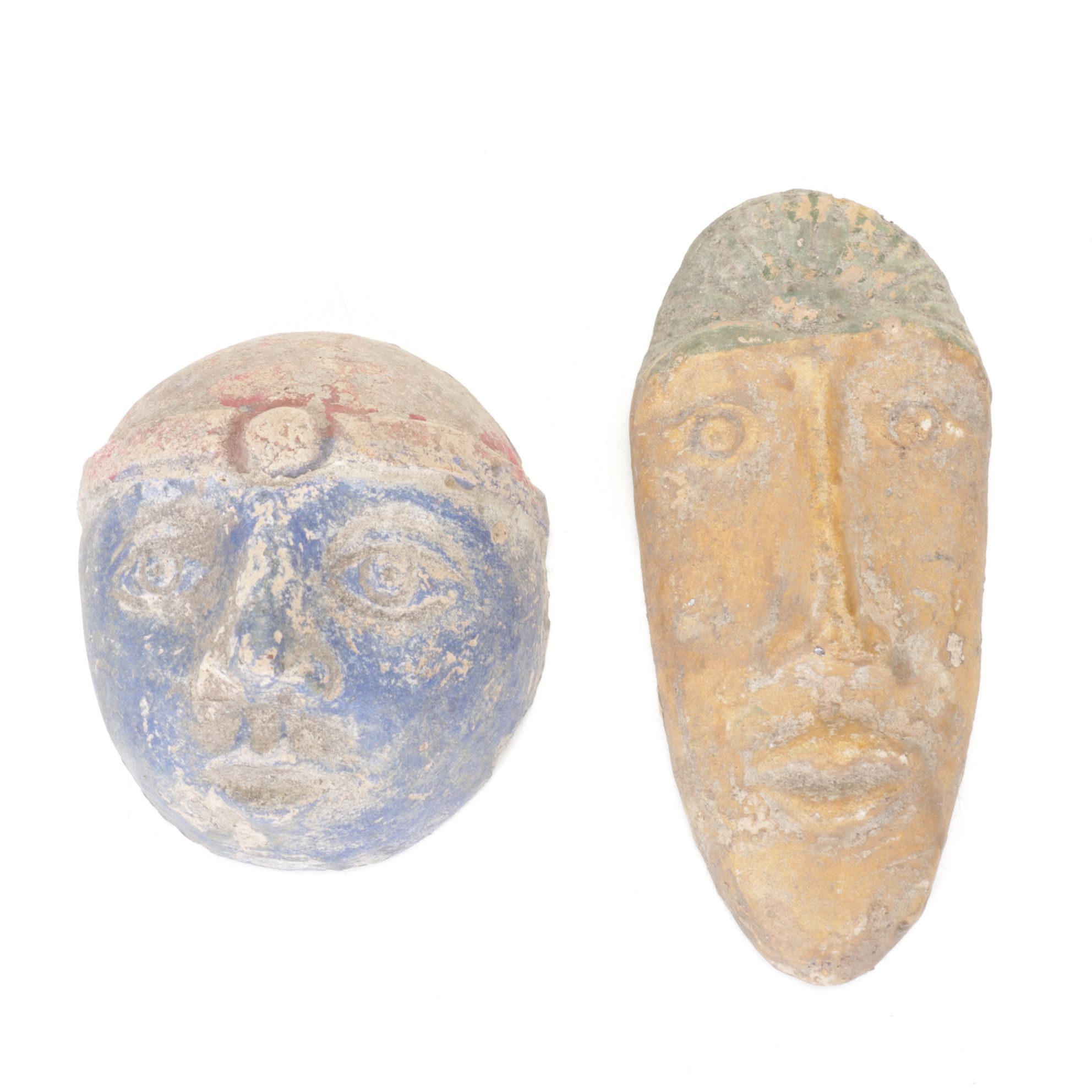 Two Cast Concrete Painted Tribalist Faces