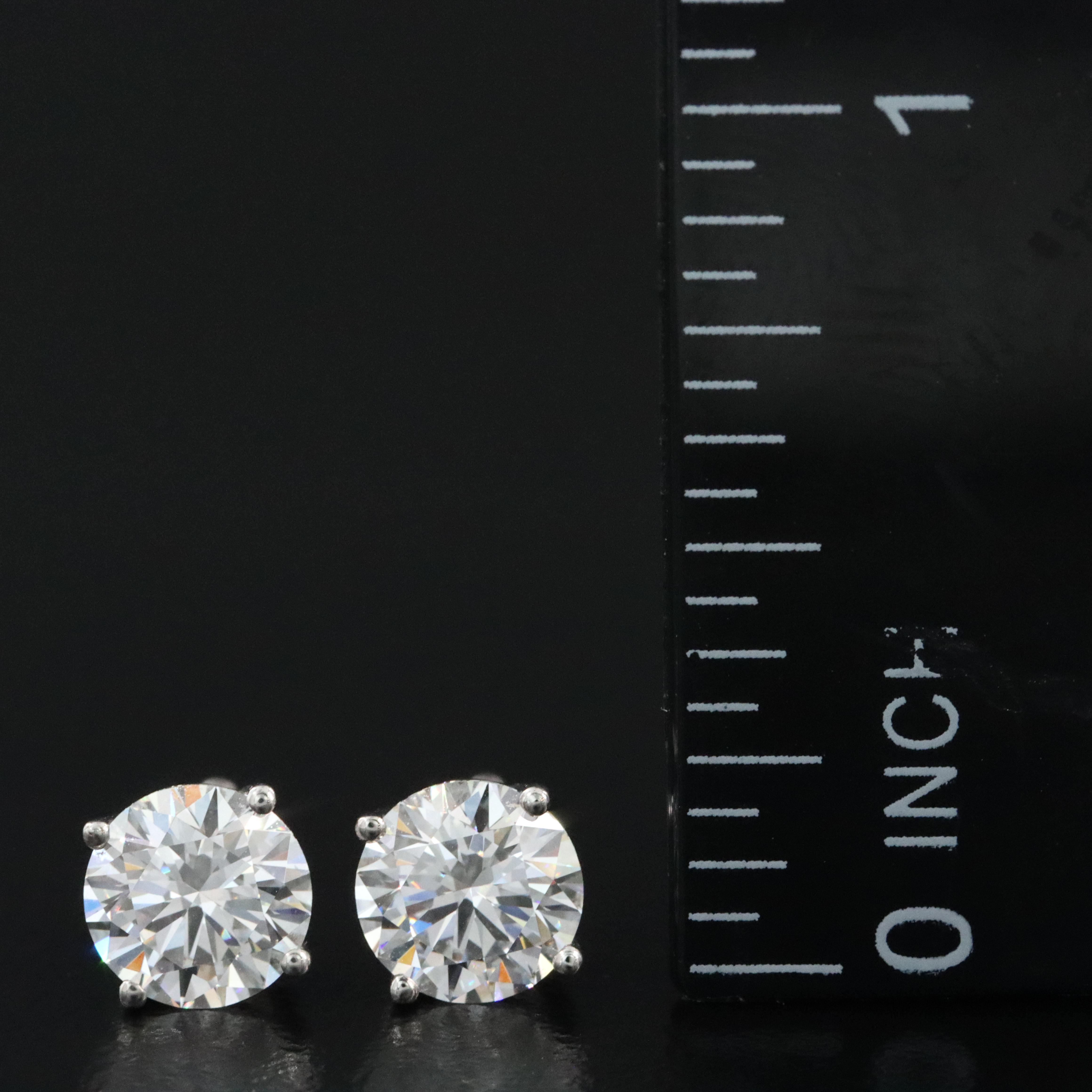 Platinum 2.10 CTW Lab Grown Diamond Solitaire Stud Earrings with IGI Reports