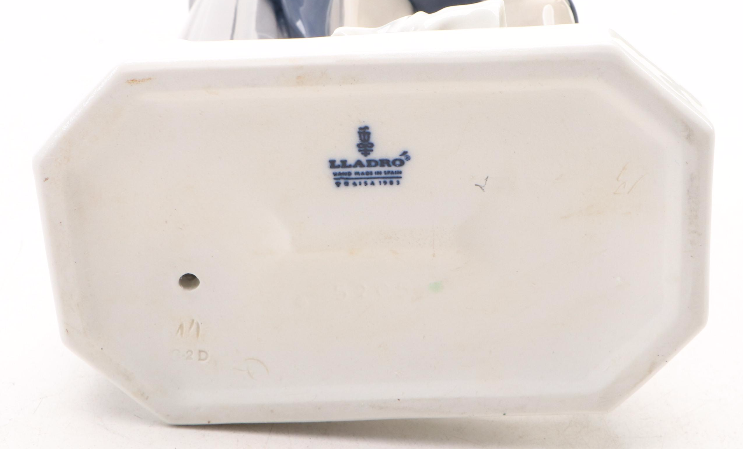 Lladró "Lamplighter" Porcelain Figurine