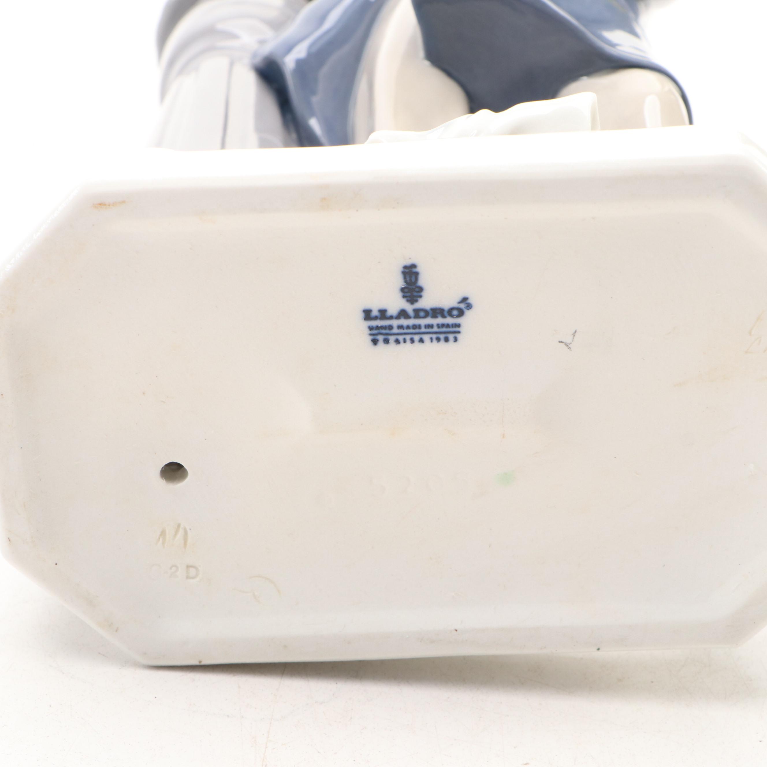 Lladró "Lamplighter" Porcelain Figurine