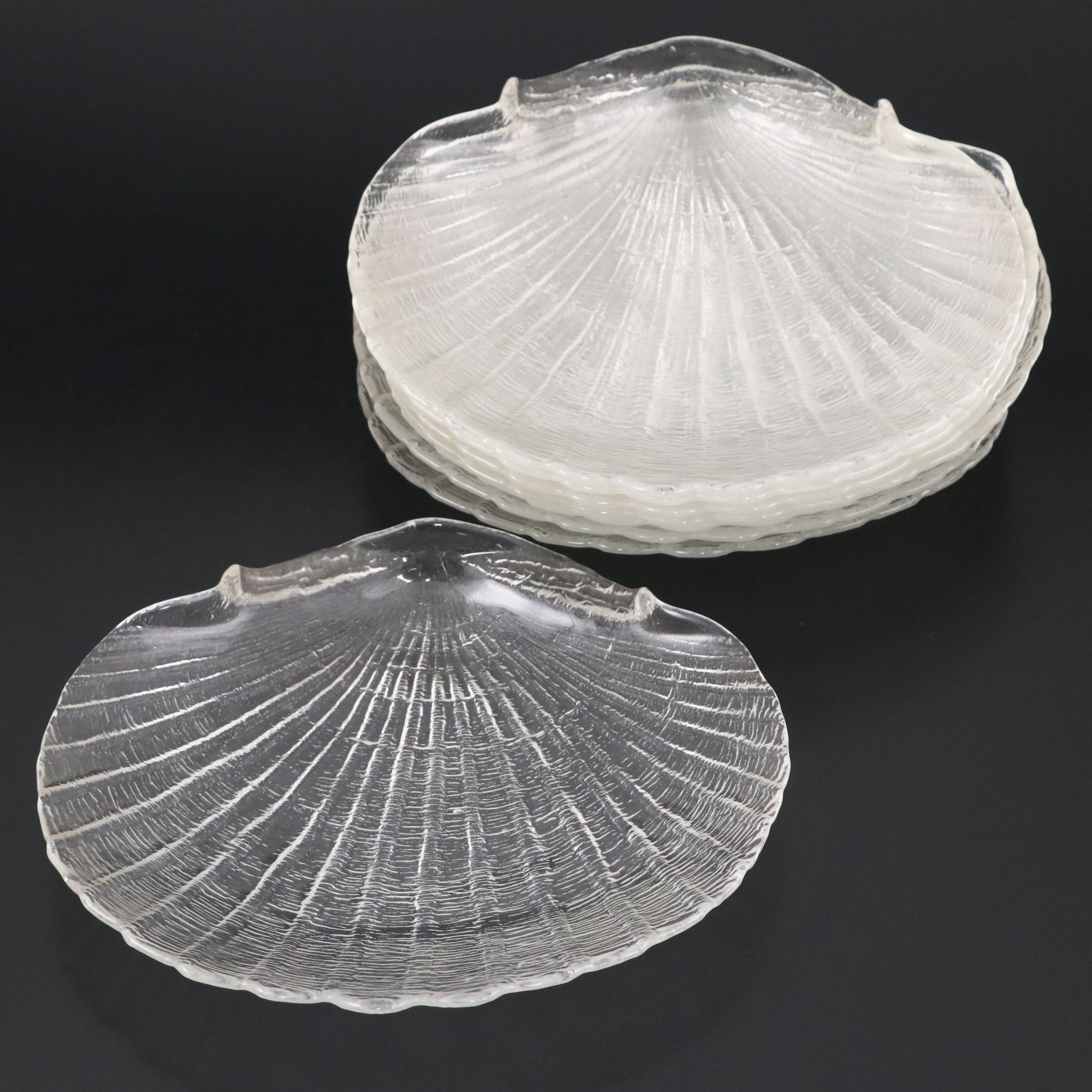 Eight Pressed Glass Shell Dinner Plates