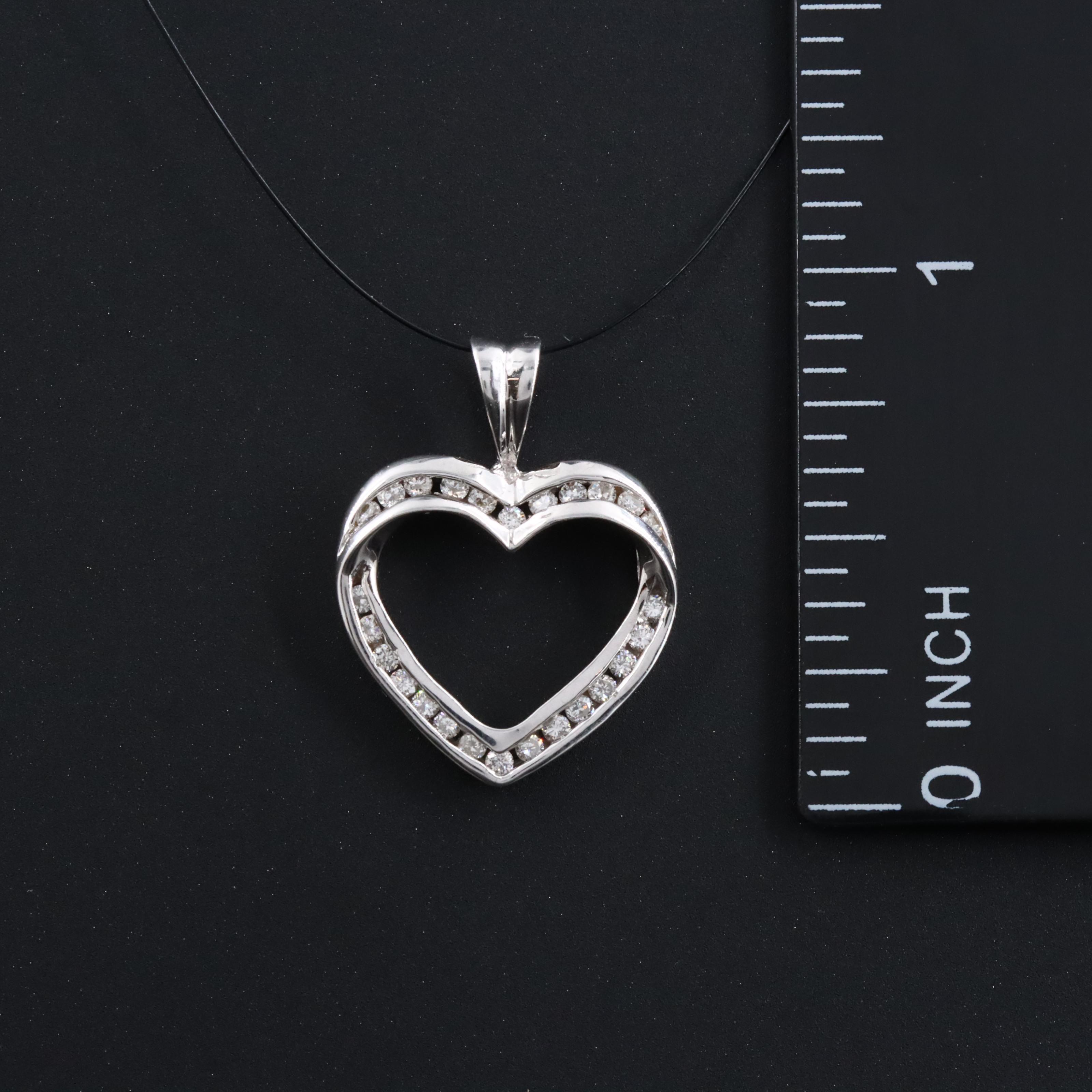 14K 0.32 CTW Diamond Heart Pendant