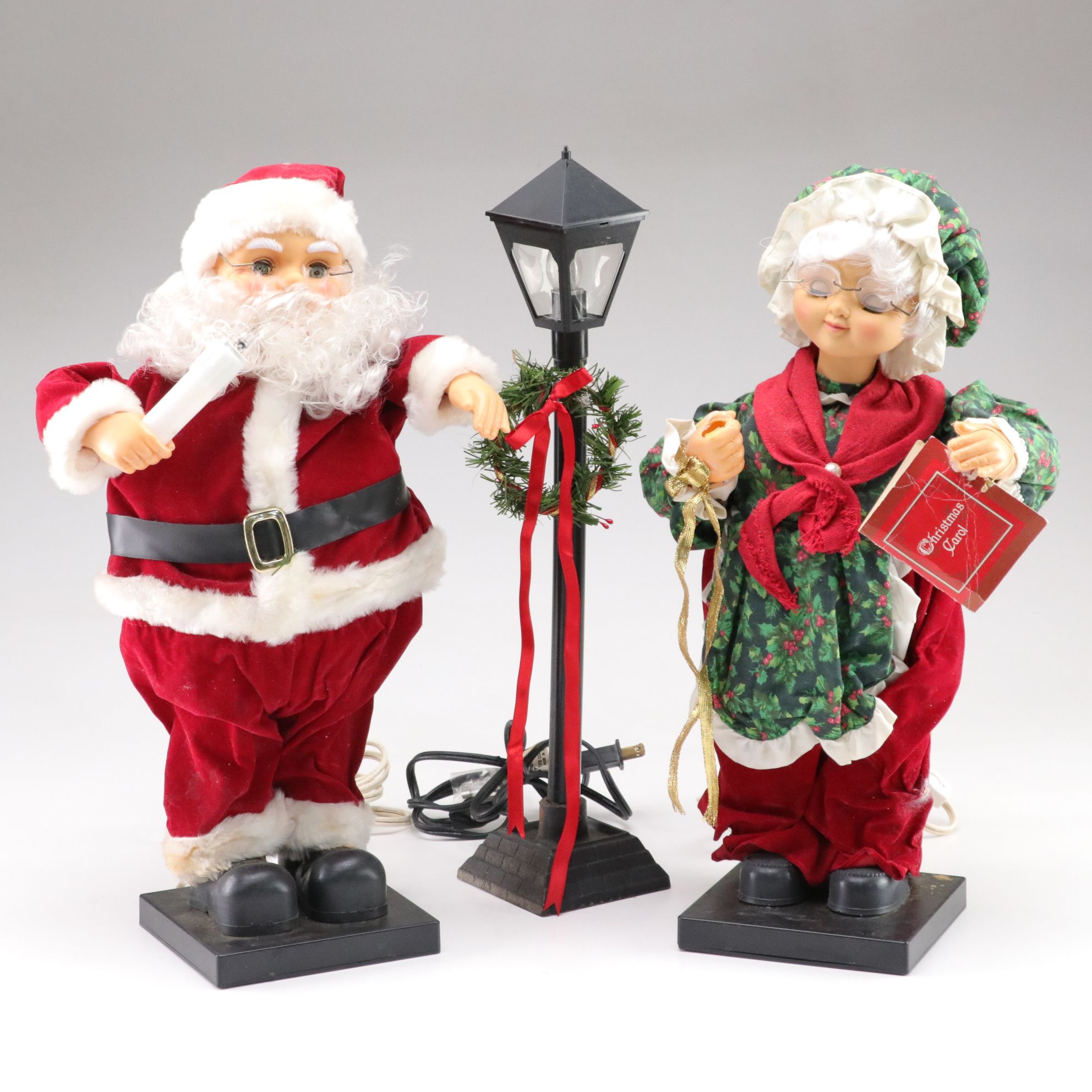 Santa Claus and Mrs. Claus with Light Post in Set of Animated Caroling Figures