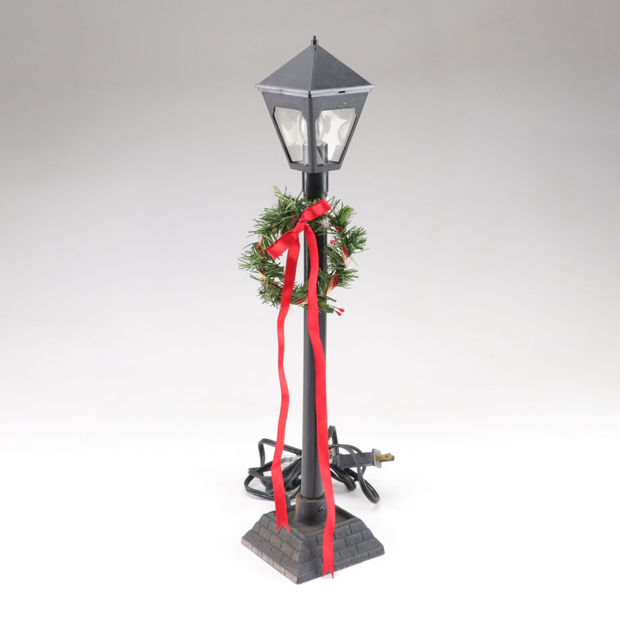 Santa Claus and Mrs. Claus with Light Post in Set of Animated Caroling Figures