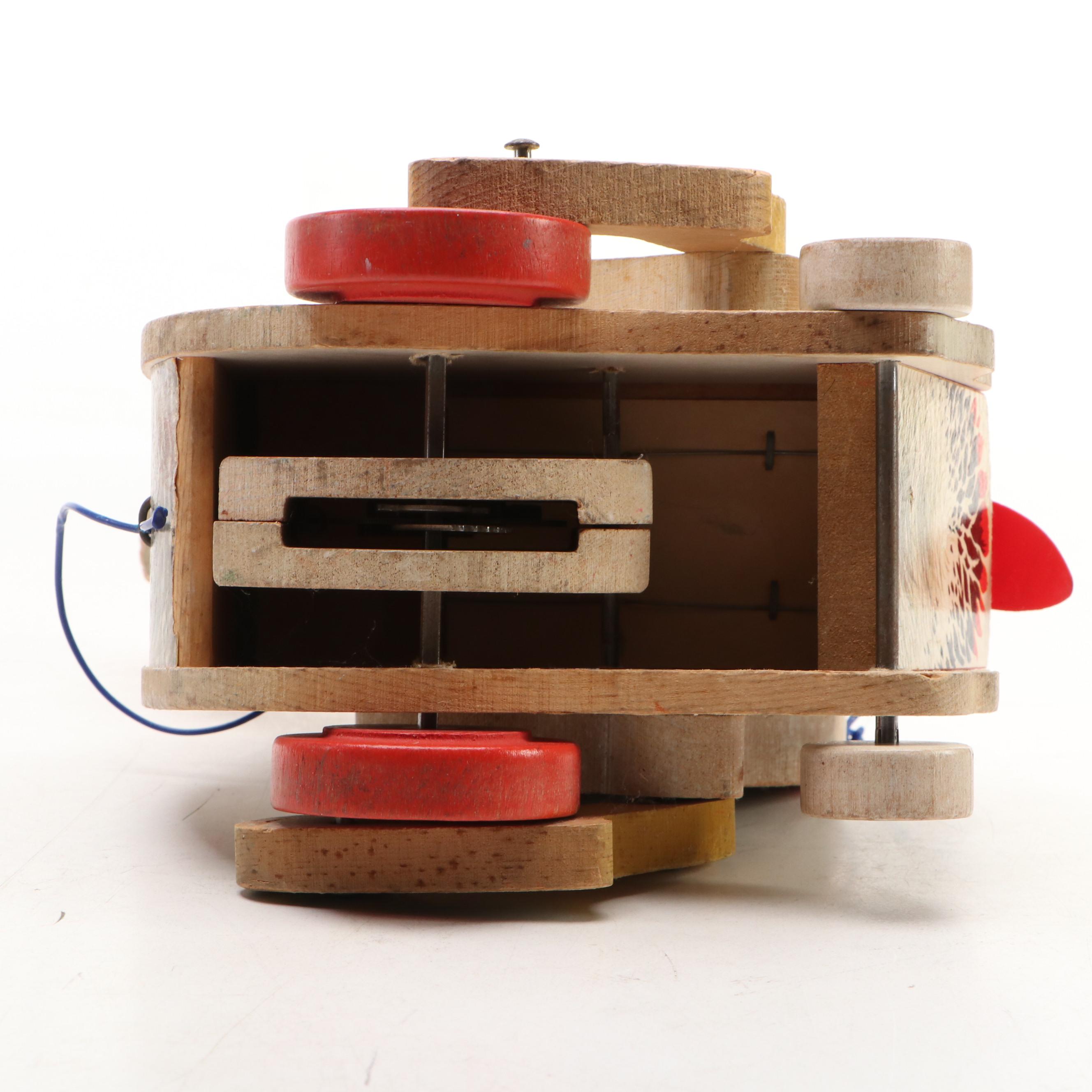Fisher-Price Musical Push Chime and the Cackling Hen Pull Toys, Mid-20th Century