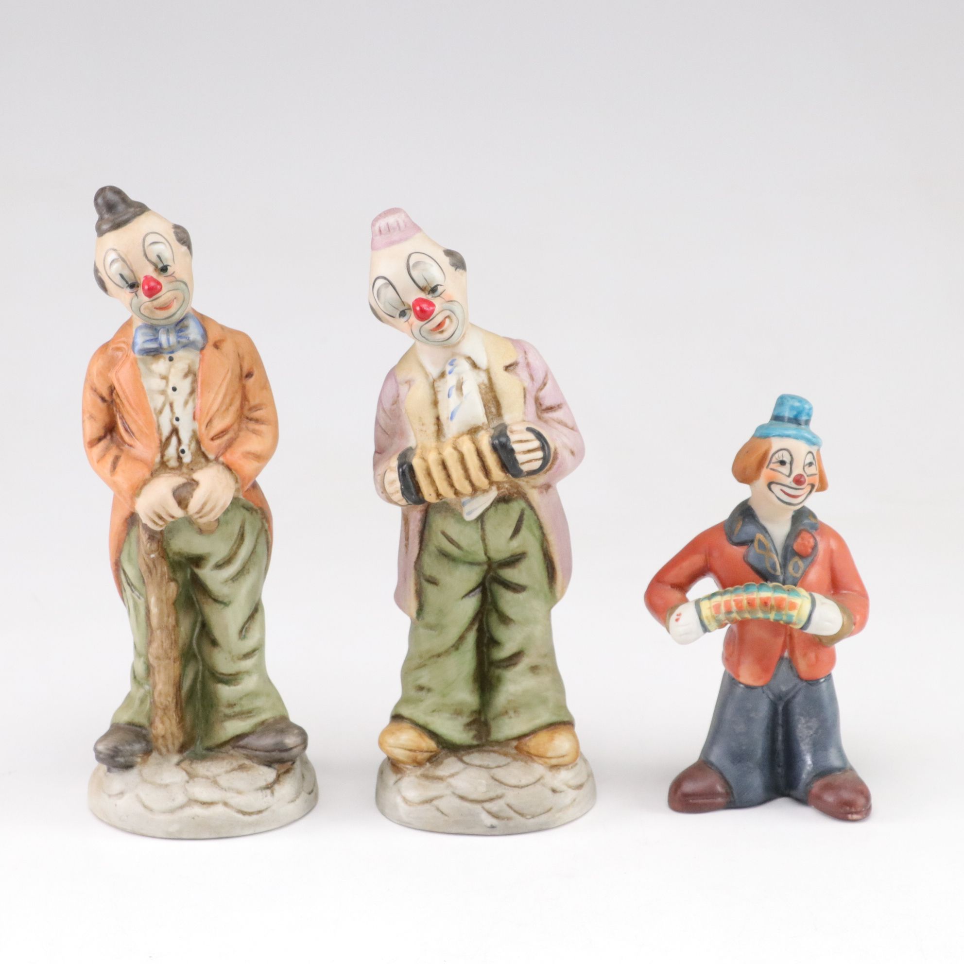 Hand-Painted Bisque Clown Figurine & Music Box Collection