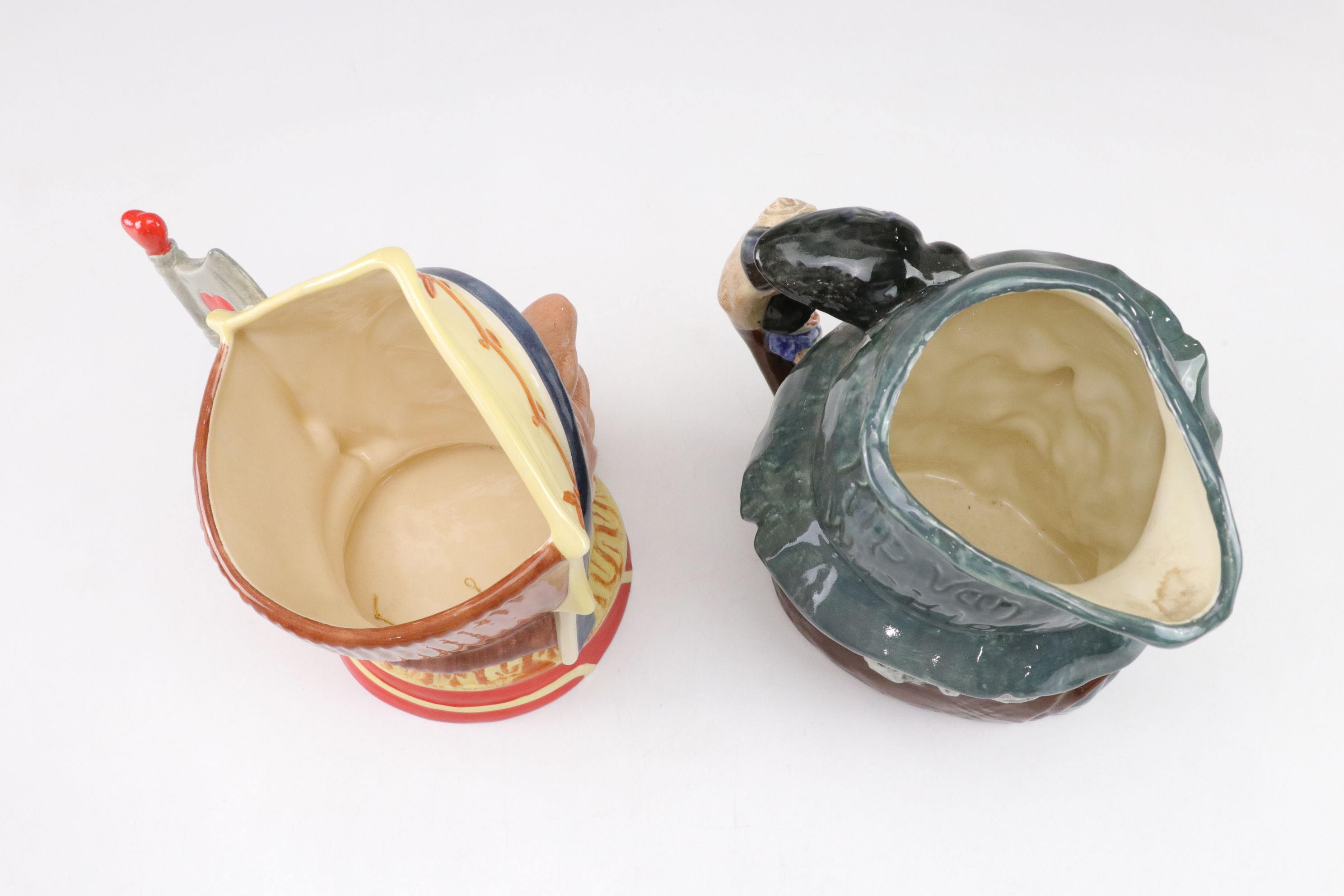 Royal Doulton Toby Jugs with "The Red Queen" and "Rip Van Winkle"