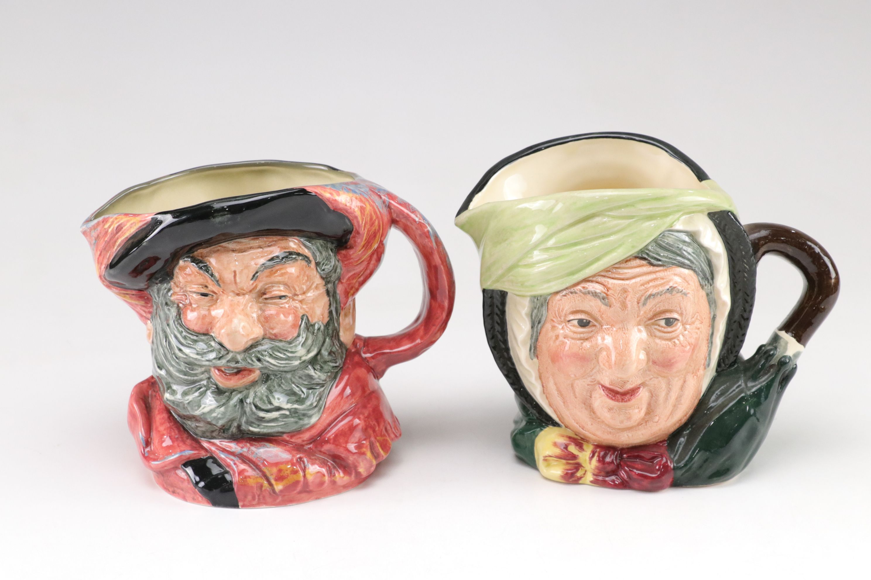 Royal Doulton Toby Jugs with "The Red Queen" and "Rip Van Winkle"