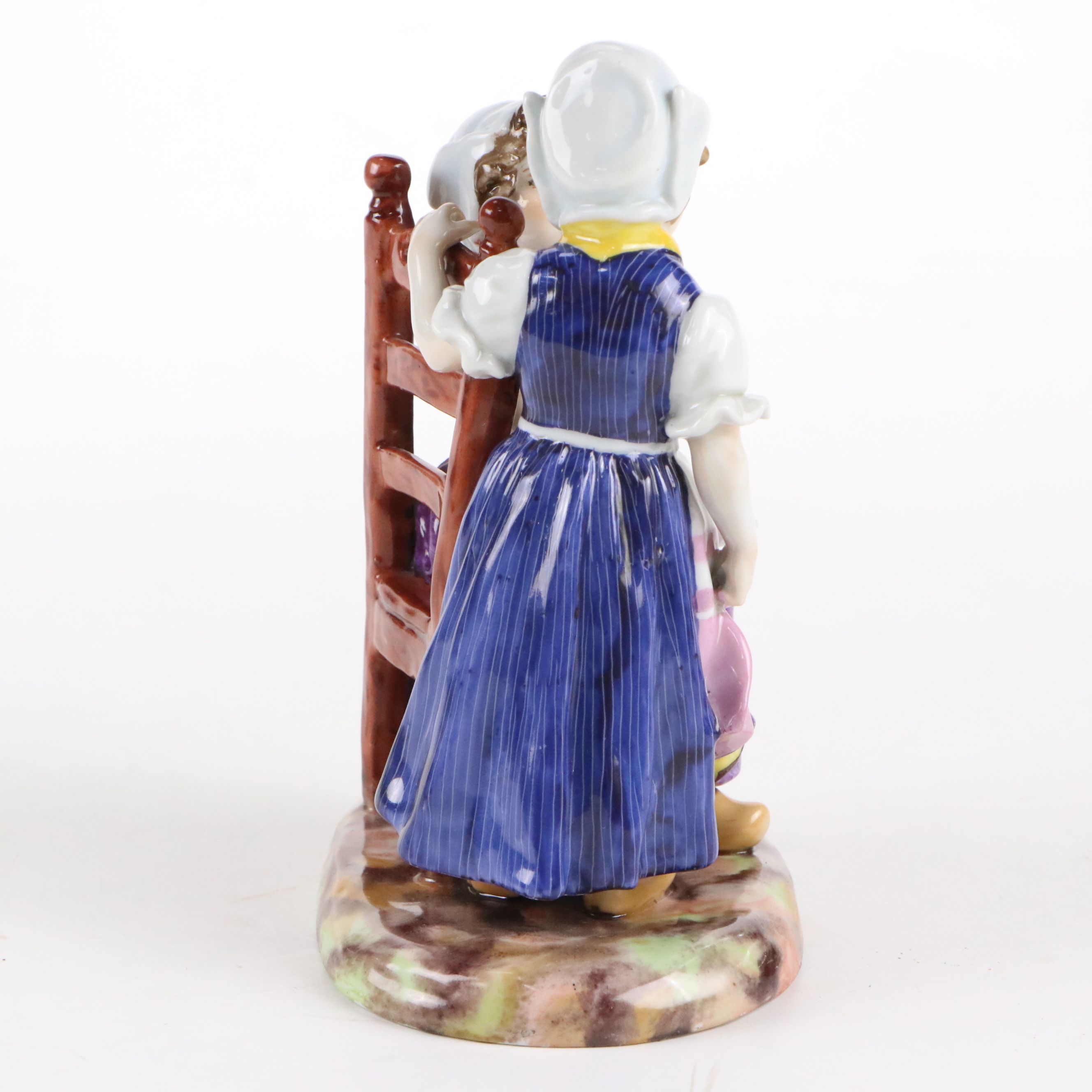 G. Schierholz & Sohn Porcelain of Two Girls Sharing Food, Early 20th Century