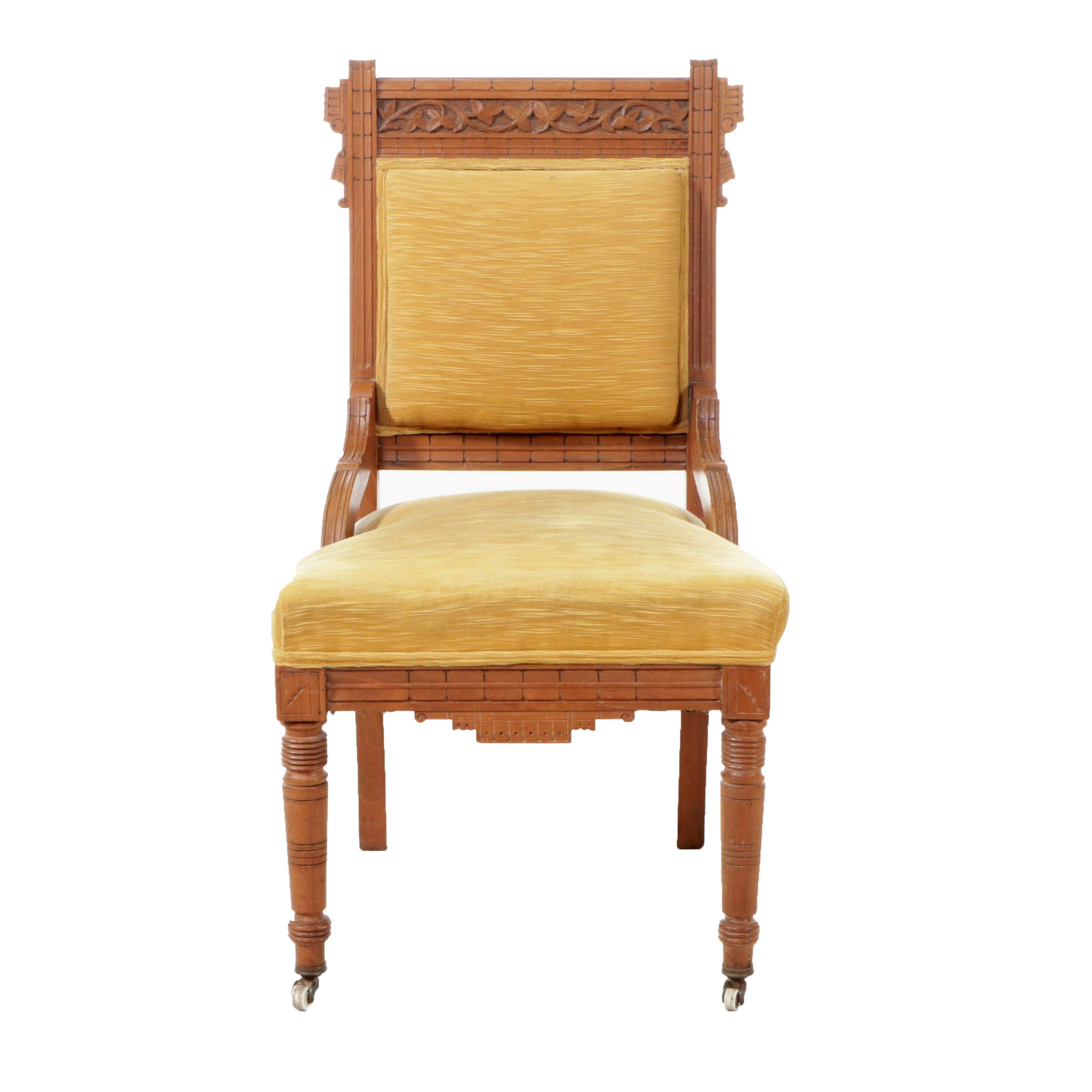 Eastlake Carved Walnut Side Chair with Porcelain Casters