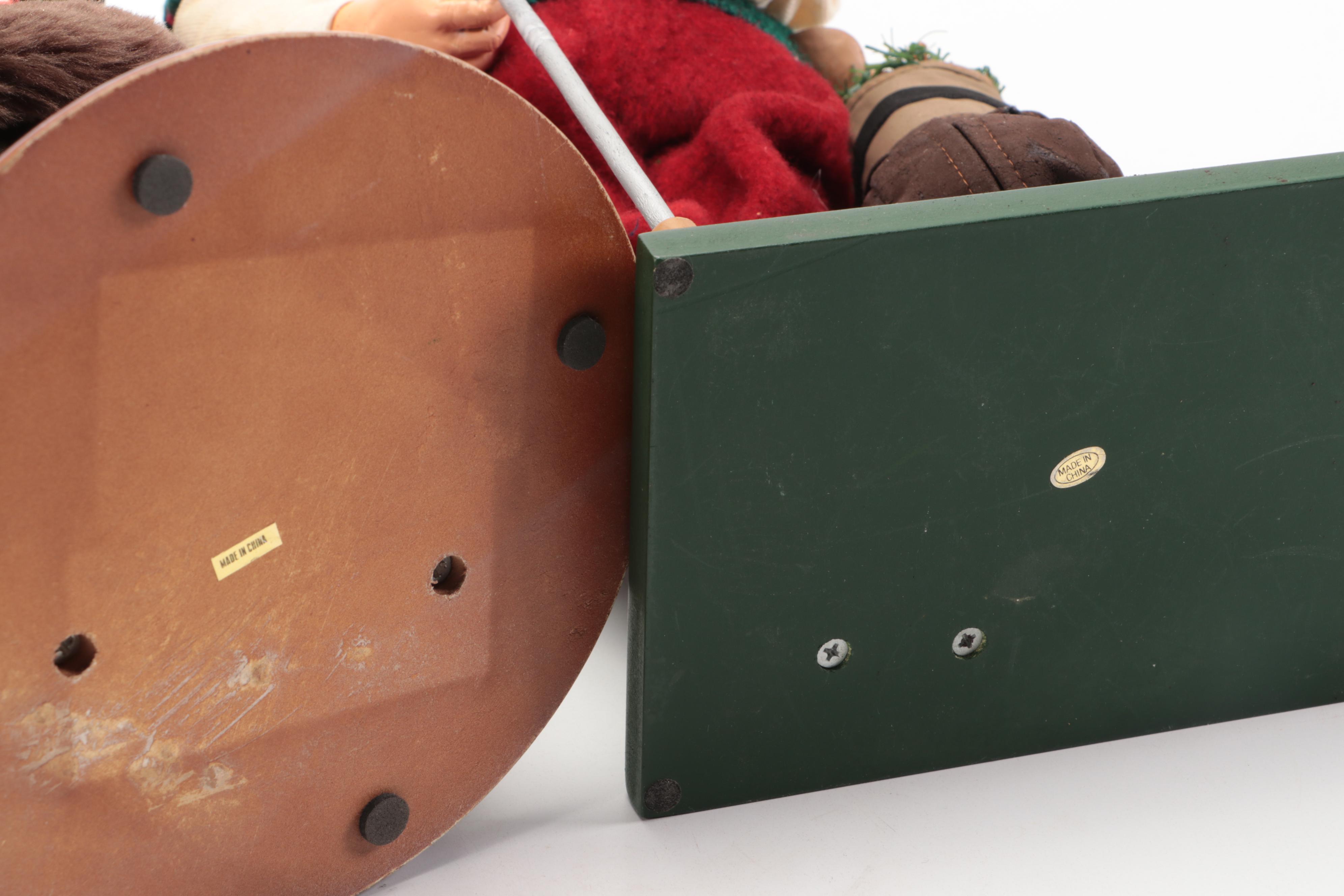 Golfing with Other Santa Claus Figurines