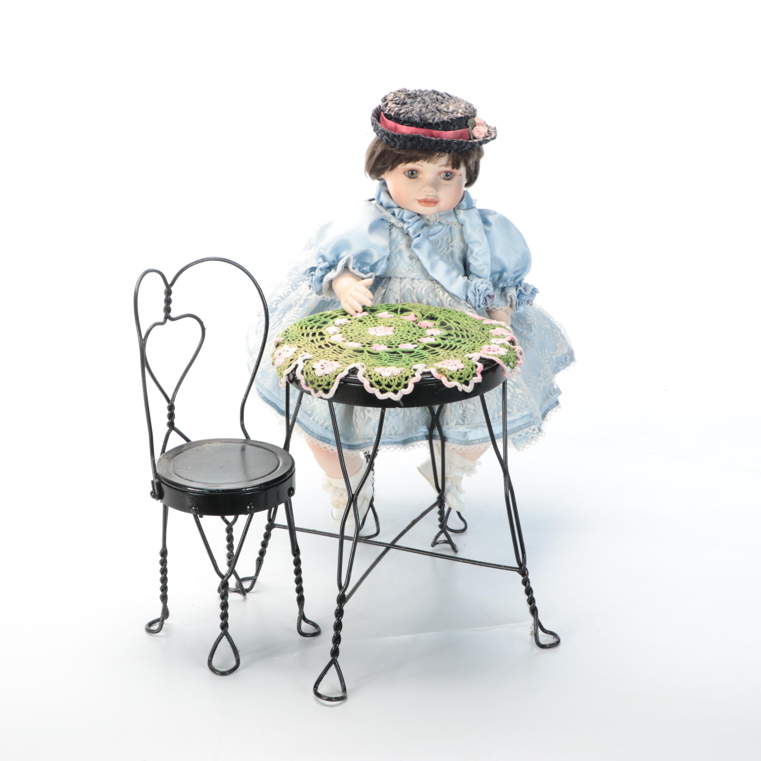 Marie Osmond Porcelain Doll with Miniature Metal Table Set and Crocheted Doily