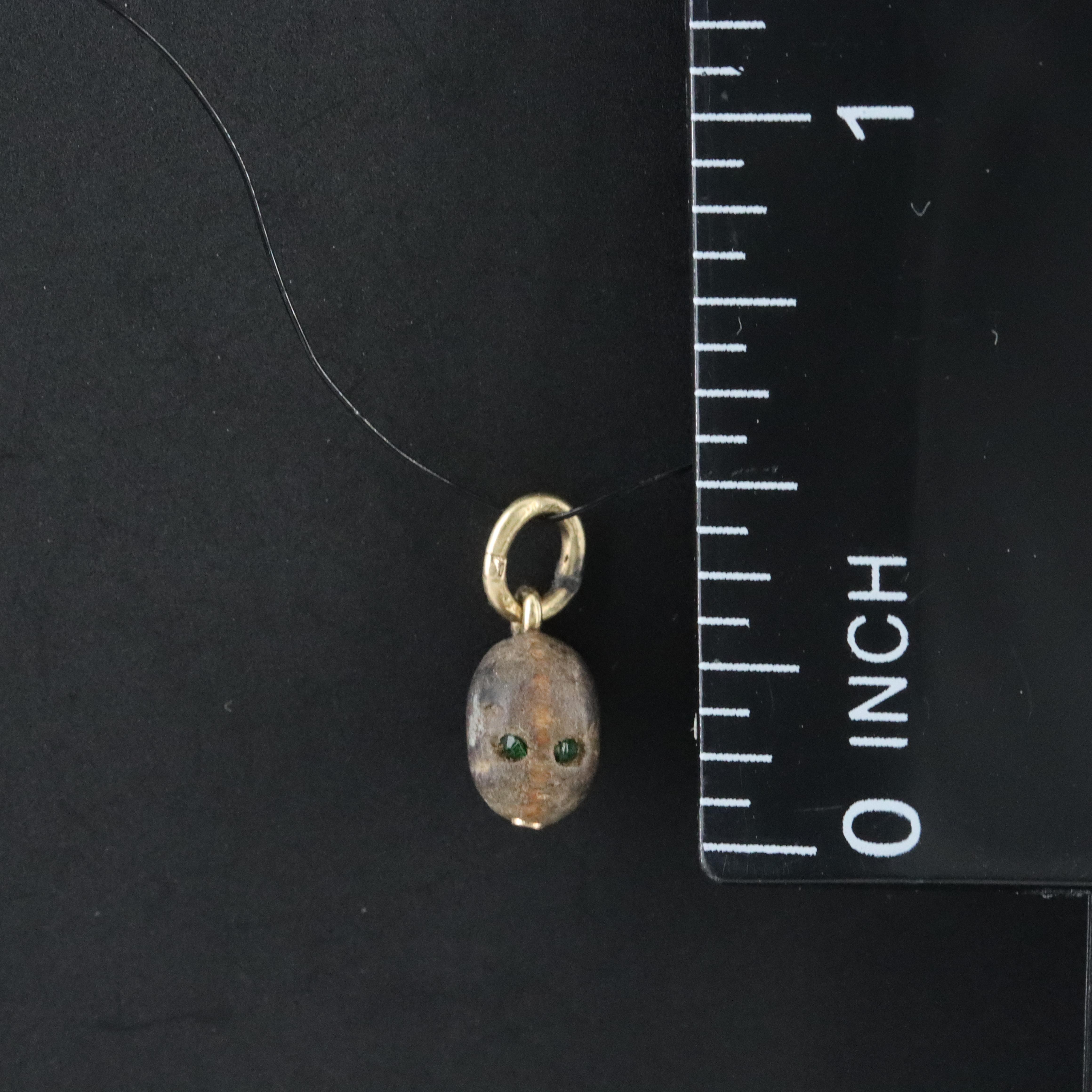 Carved Head Stone Charm Pendant with Glass Eyes