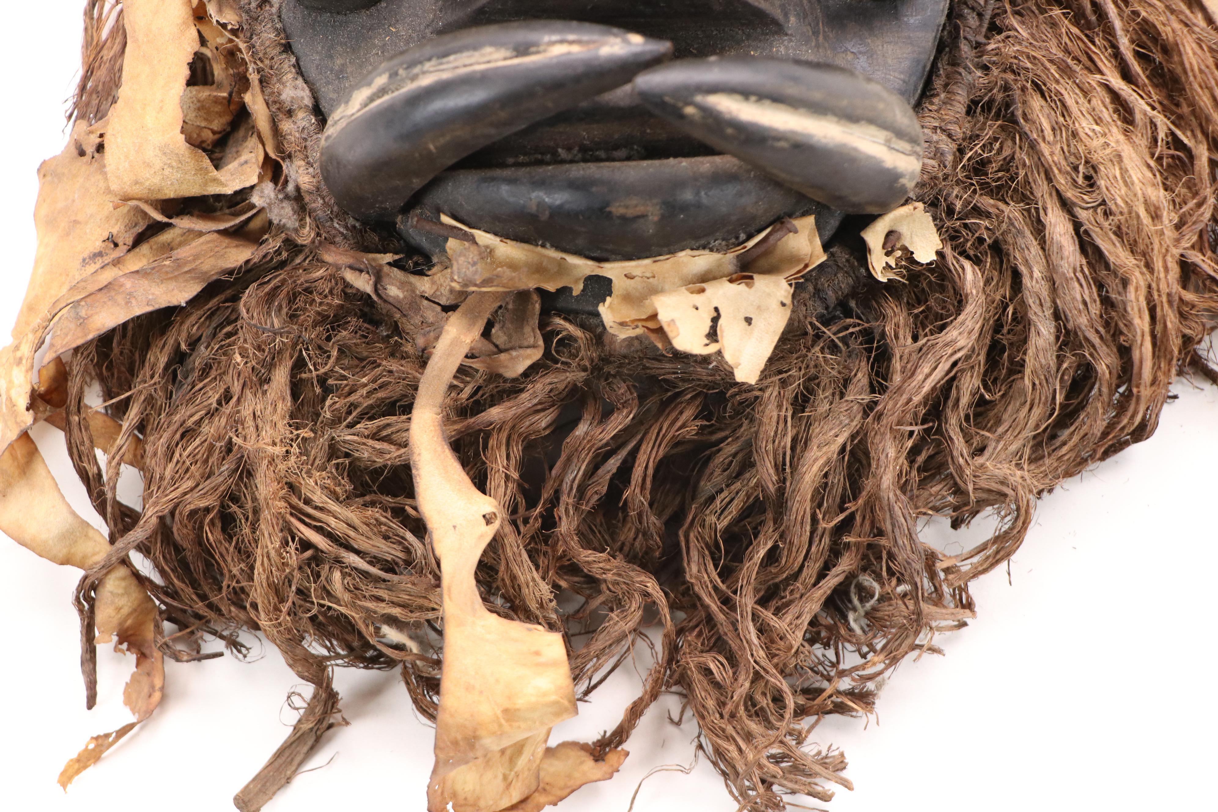 West African Style Hand-Carved Wooden Mask with Raffia Beard