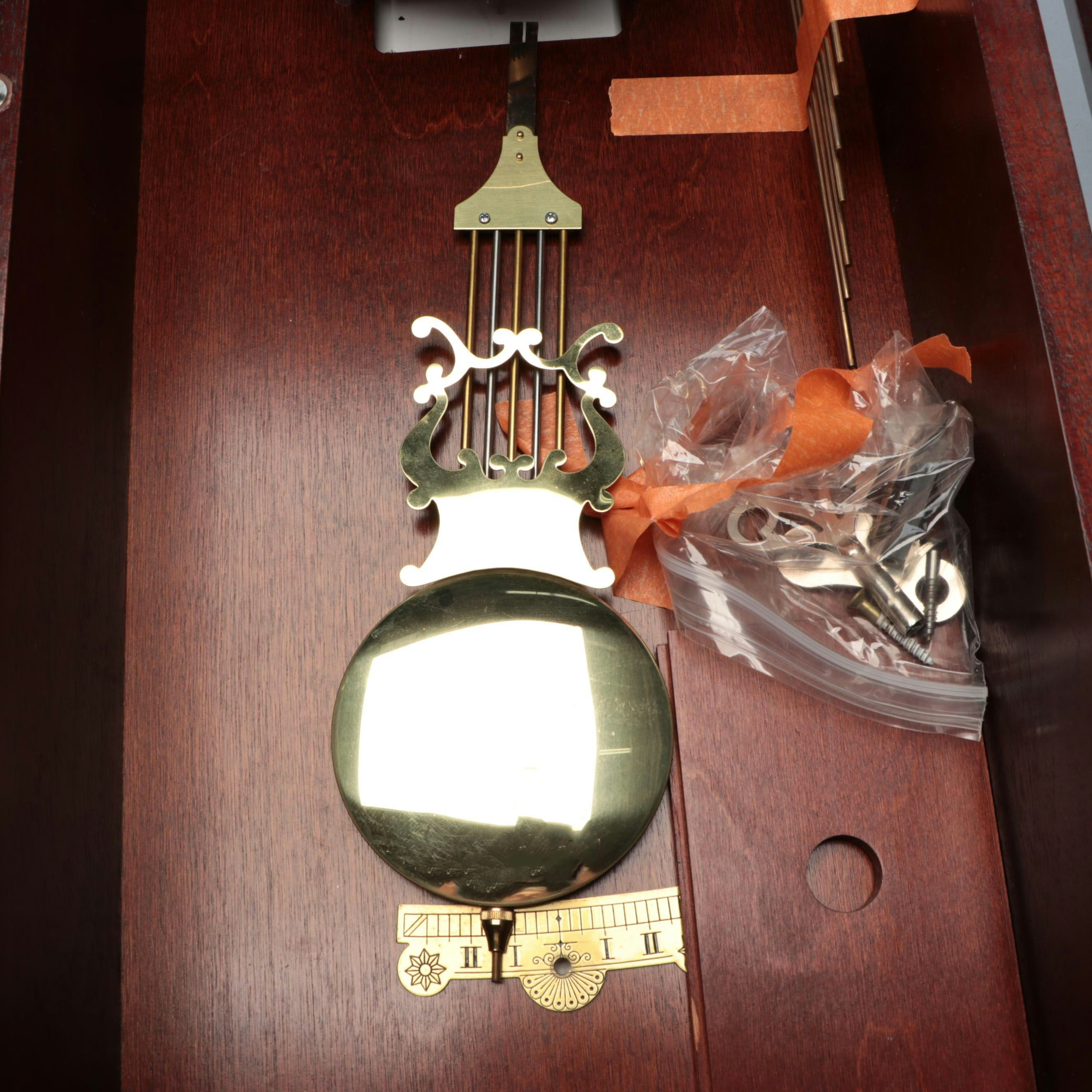 Howard Miller "Jennison" Mahogany Finish Wall Clock