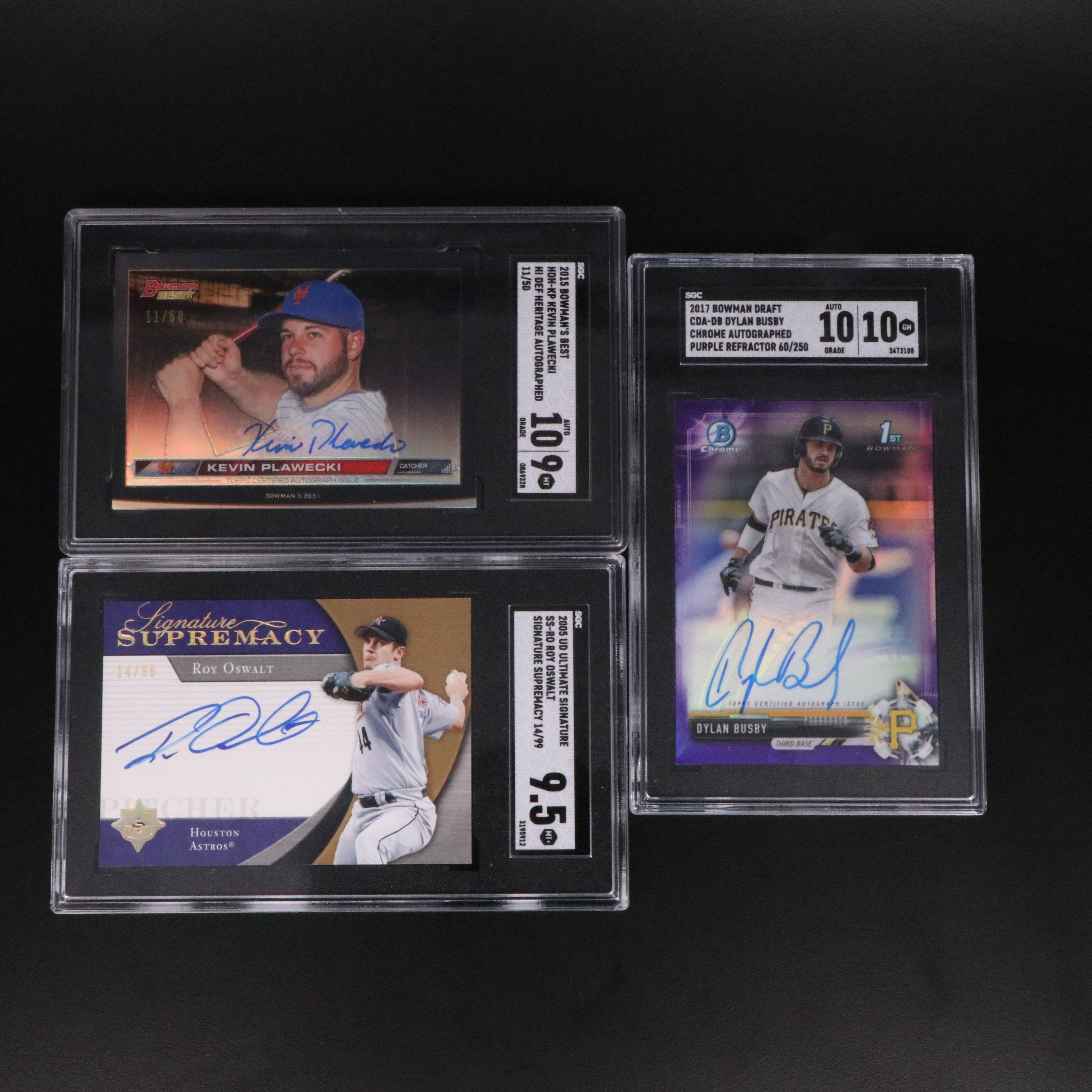 Dylan Busby, Roy Oswalt, and Kevin Plawecki Signed SGC Graded Baseball Cards