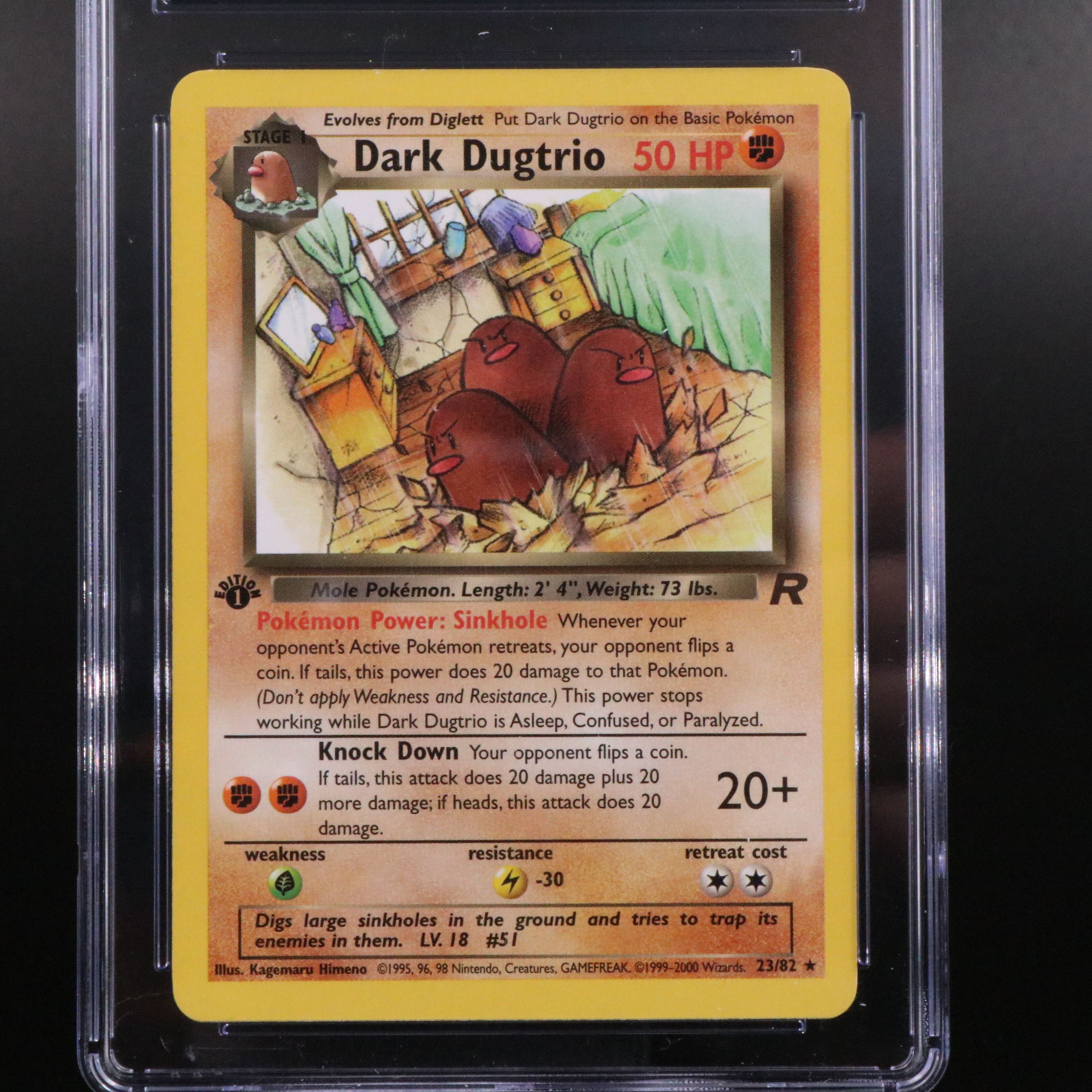 Team Rocket 1st Edition Dark Dugtrio Pokémon Card Graded CGC 9