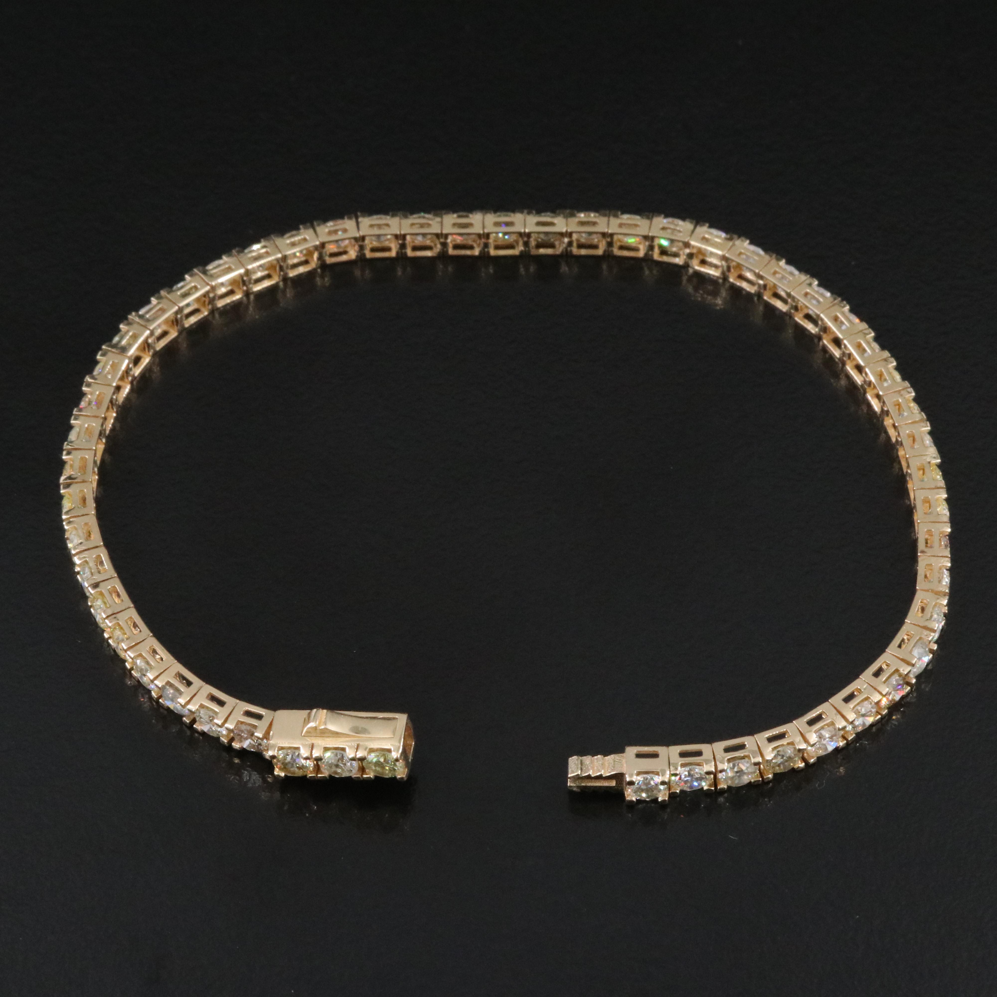 14K 6.41 CTW Diamond Line Bracelet with IGI Report and Fancy Diamonds